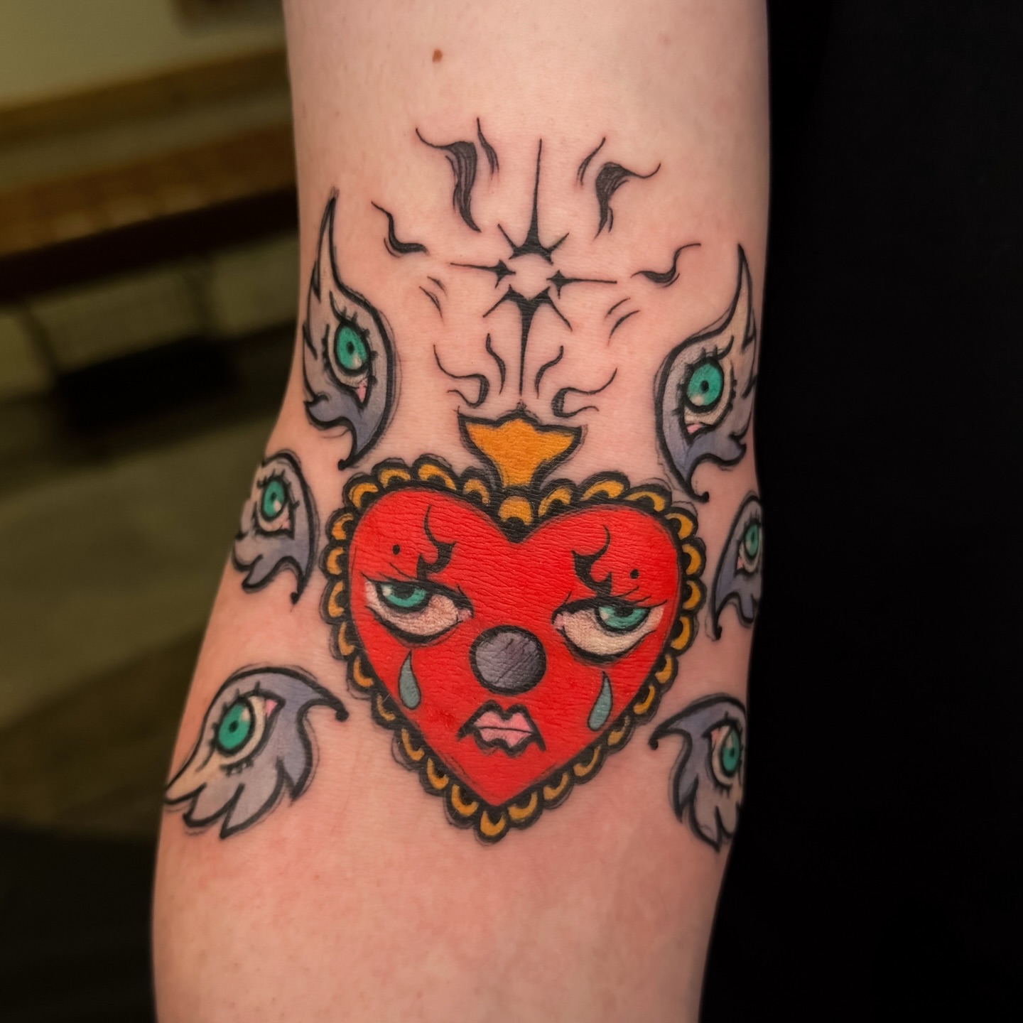 Heart with eyes American traditional tattoo on the forearm by Hades cabrera, Richmond, Virginia