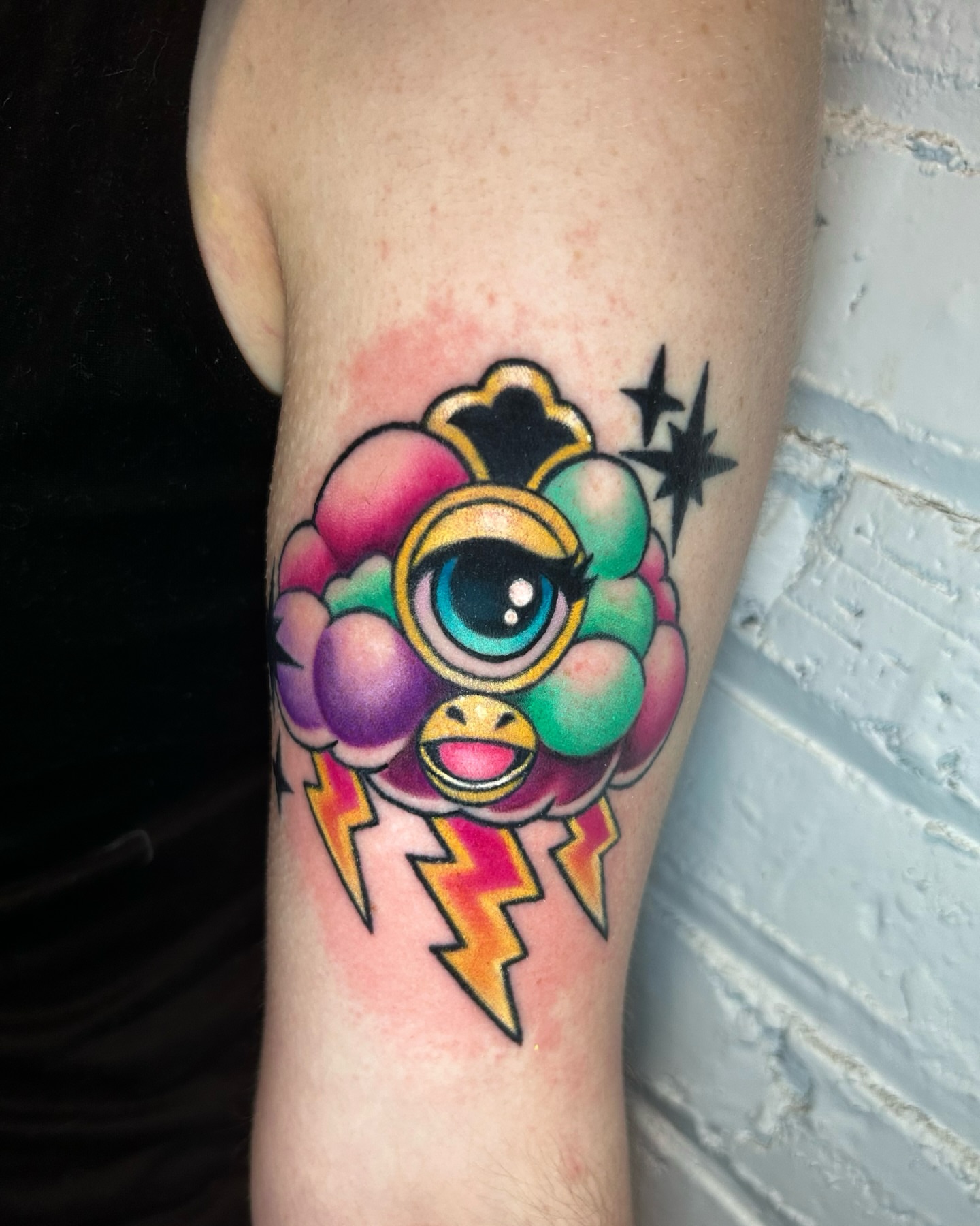 Eye with cloud new school tattoo on the forearm by Zephyr