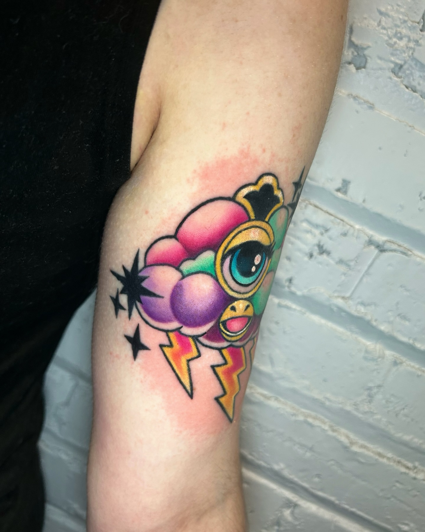 Ice cream cone new school tattoo on the forearm by Zephyr