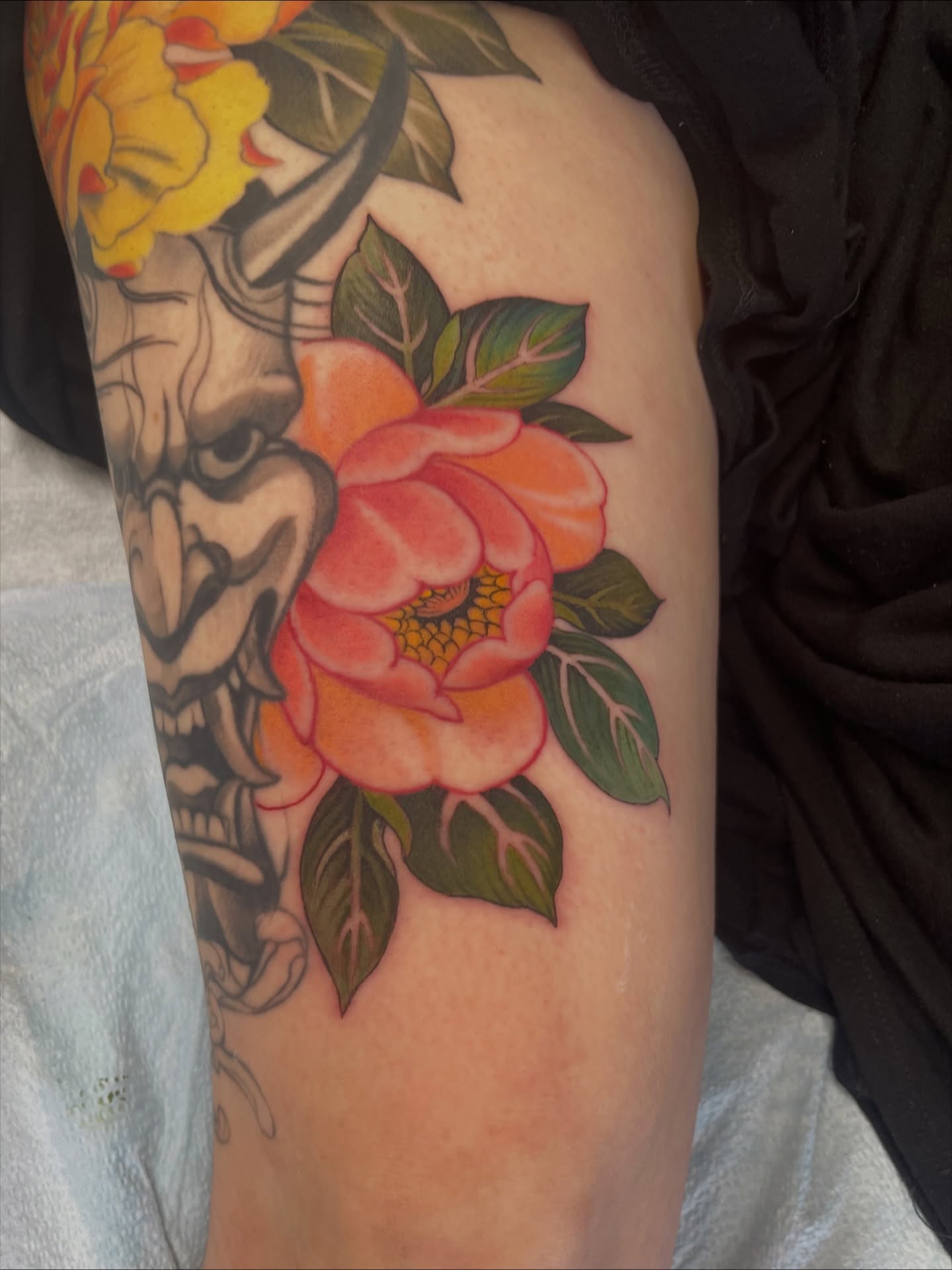 Peony and skull American traditional tattoo on the forearm by Collie Mills, Philadelphia, Pennsylvania