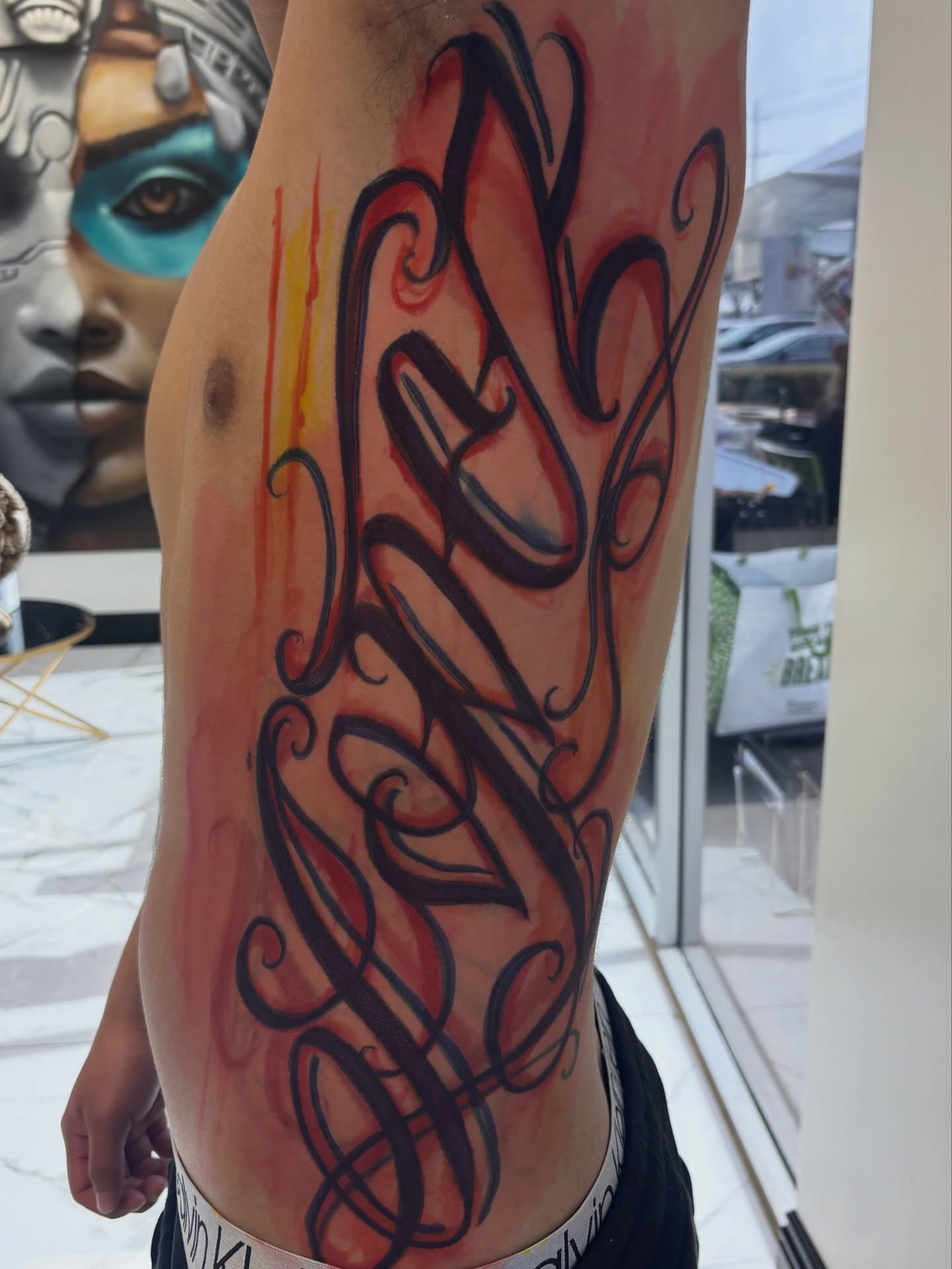 Swirls tribal tattoo on the thigh by Cristiano Ochoa, Elk Grove, California