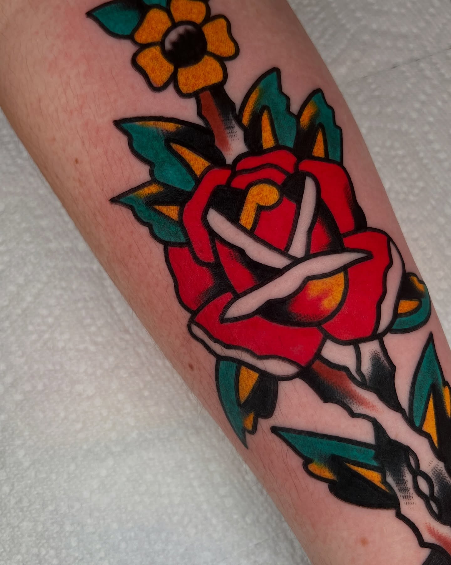 Rose American traditional tattoo on the forearm by Like A Horse Corral