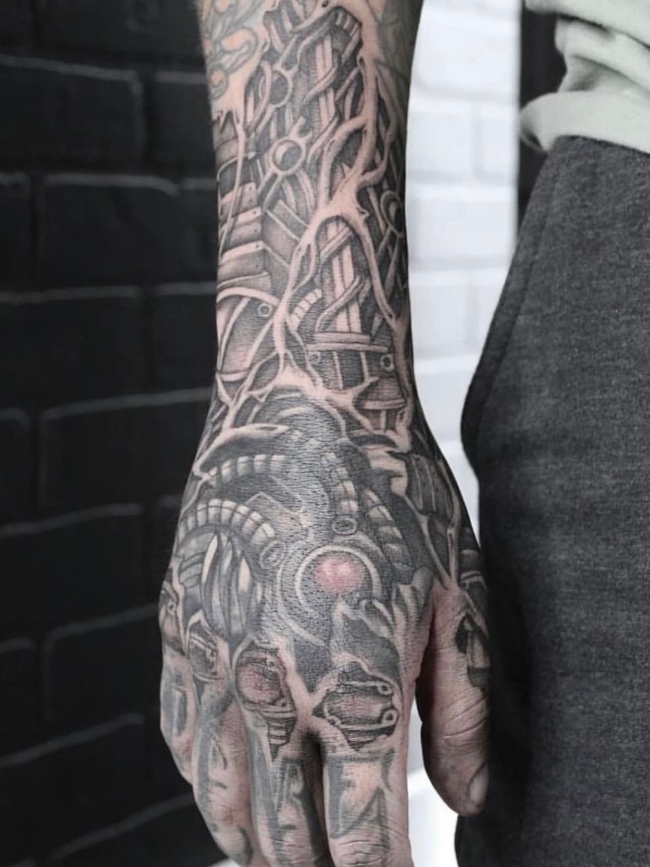 Mechanical gears and circuitry geometric tattoo on the hand by Joe Weber, Monona, Wisconsin