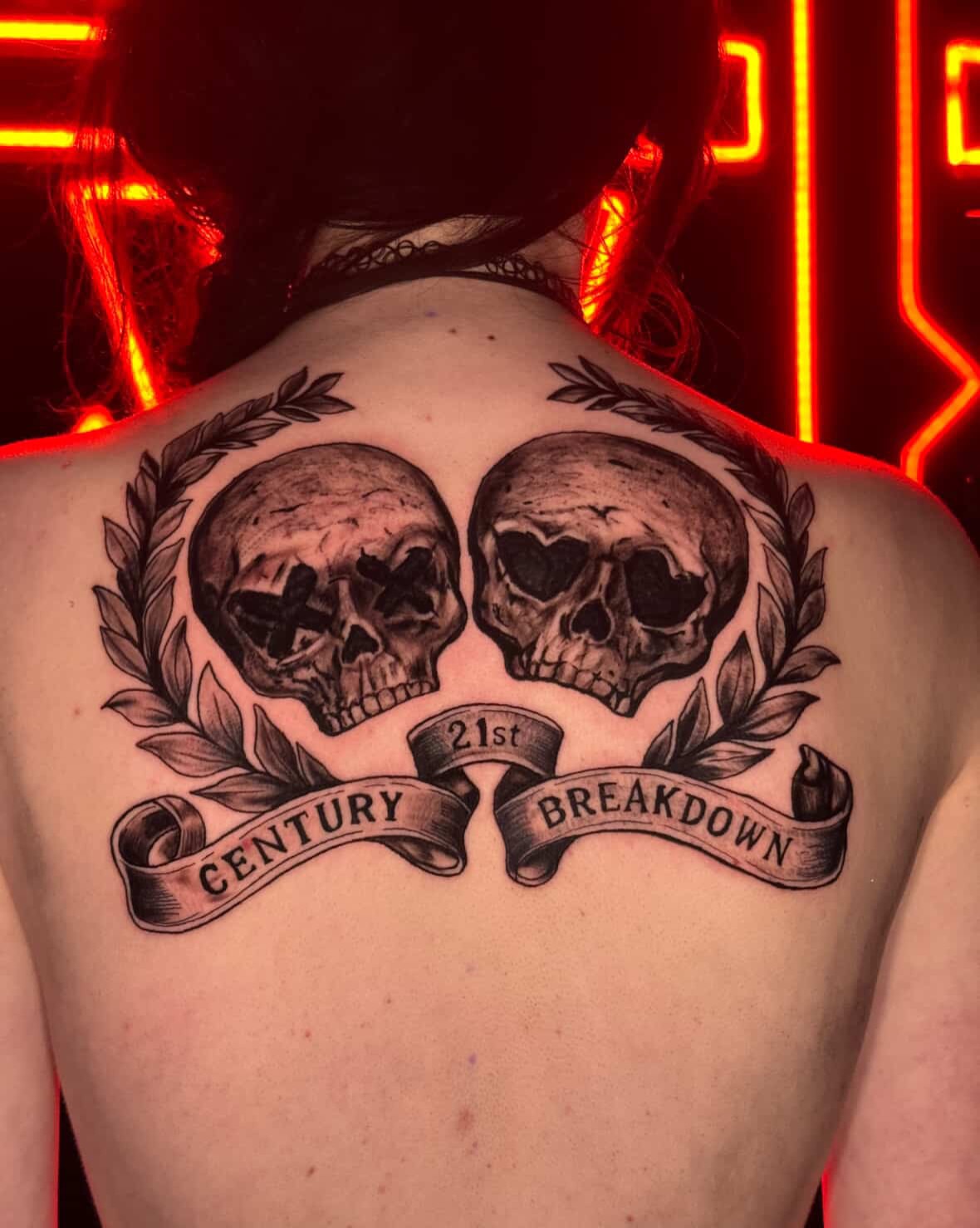 Skulls realism tattoo on the back by Ryan Hindenach