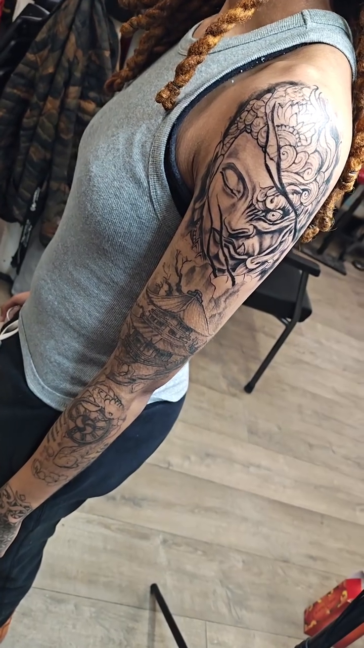 Portrait with script on arm realism tattoo on the upper arm by @cvpital