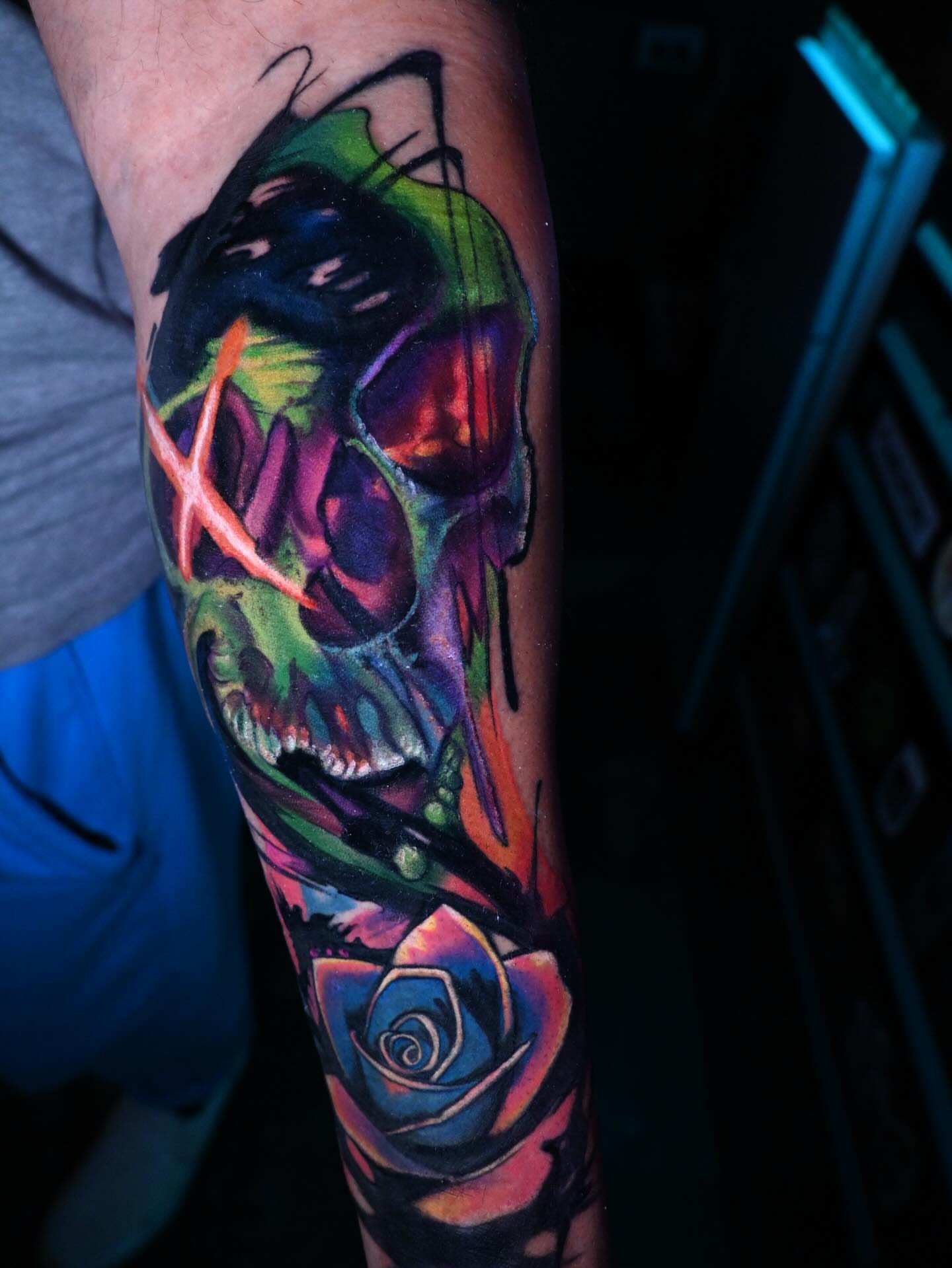 Skull and rose new school tattoo on the forearm by William Pollock