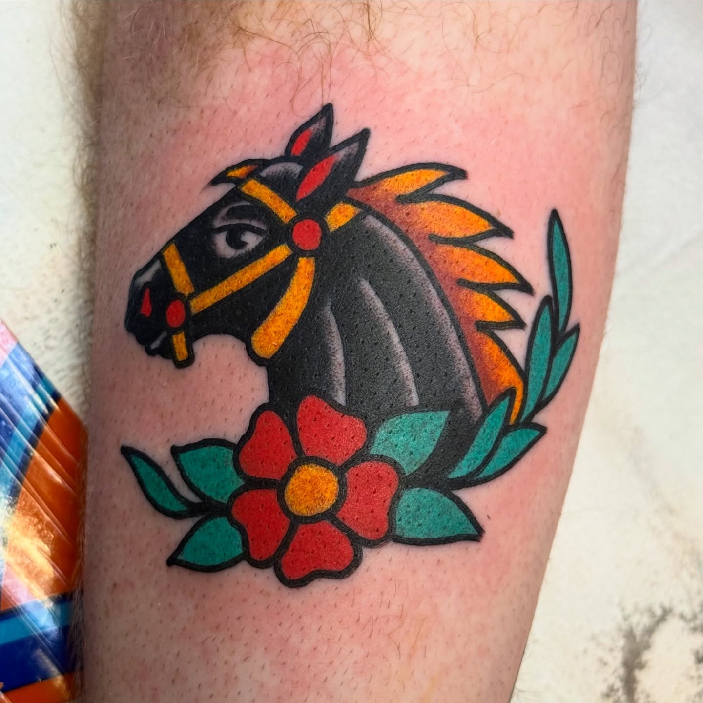Horse and flower American traditional tattoo on the forearm by ๐ฎ๐๐๐๐ ๐ญ๐๐๐๐๐