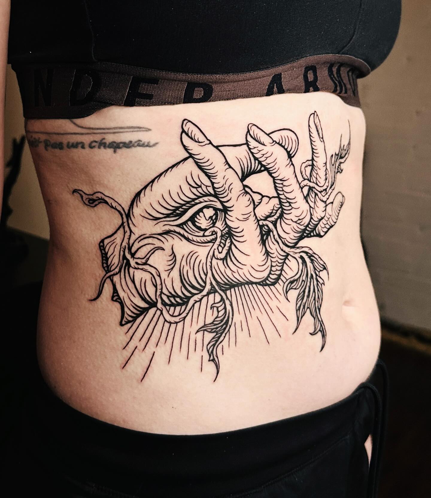 Eye and hand black and grey tattoo on the torso by 𝕾𝖆𝖘𝖍𝖆 𝖂𝖔𝖑𝖆𝖓𝖉