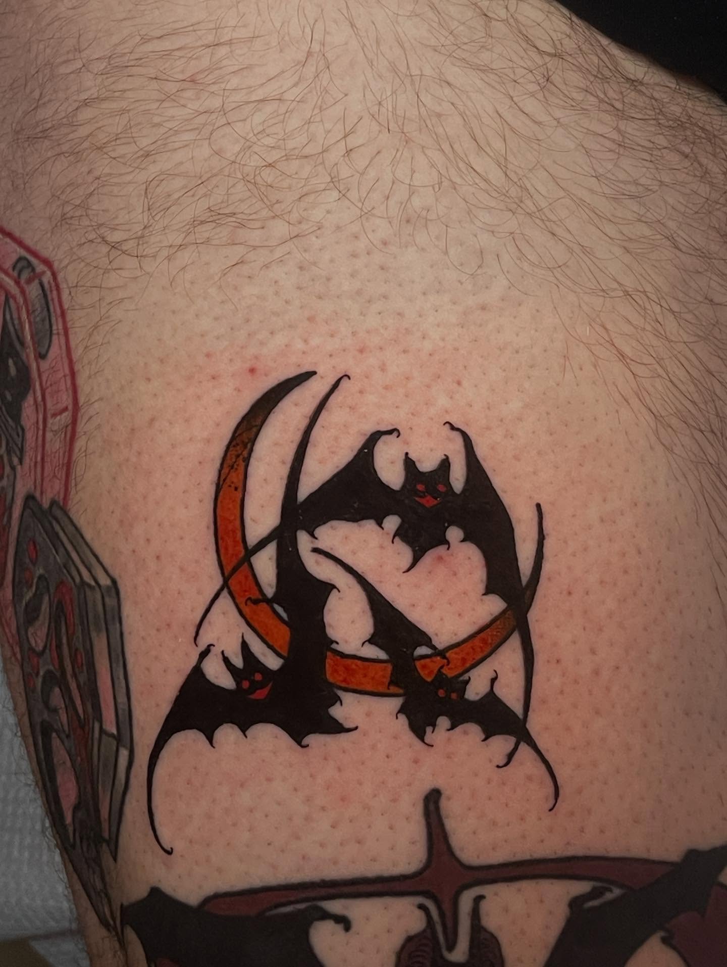 Bat American traditional tattoo on the chest by Joe Moreira