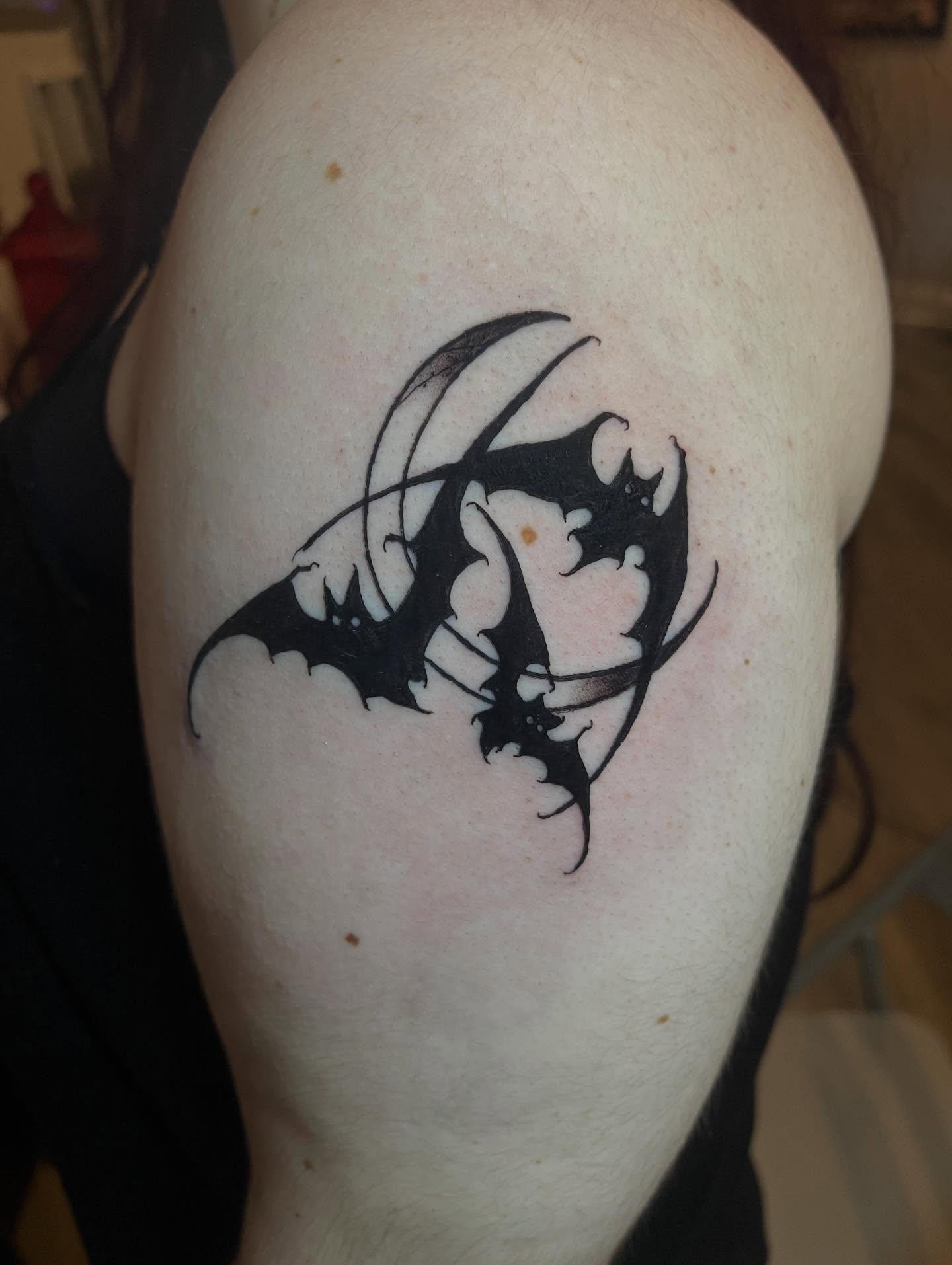 Bat black and grey tattoo on the shoulder by Joe Moreira