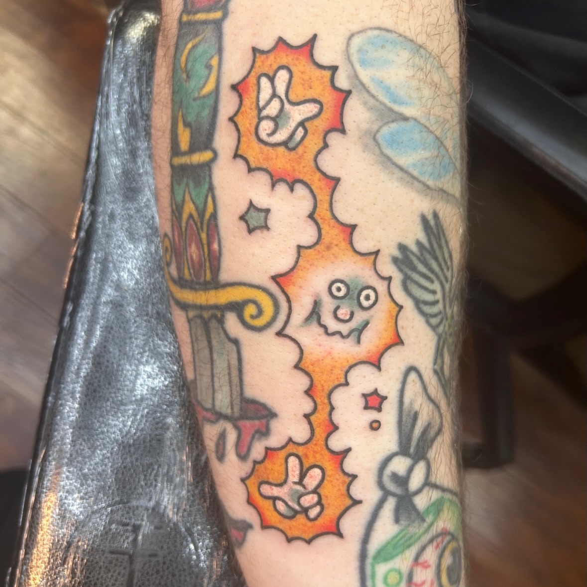 Space-themed tattoo American traditional tattoo on the forearm by Jordan Wray