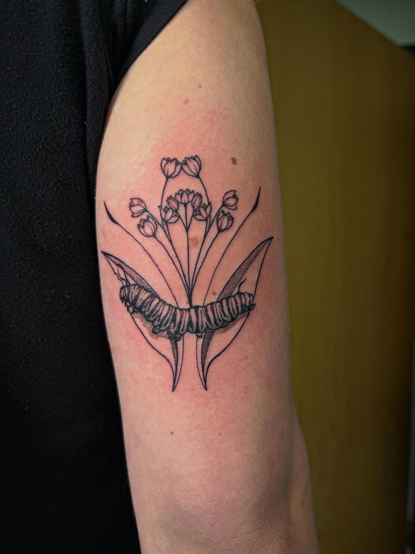 Lily of the valley black and grey tattoo on the forearm by Taytum Marsing, Salt Lake City, Utah