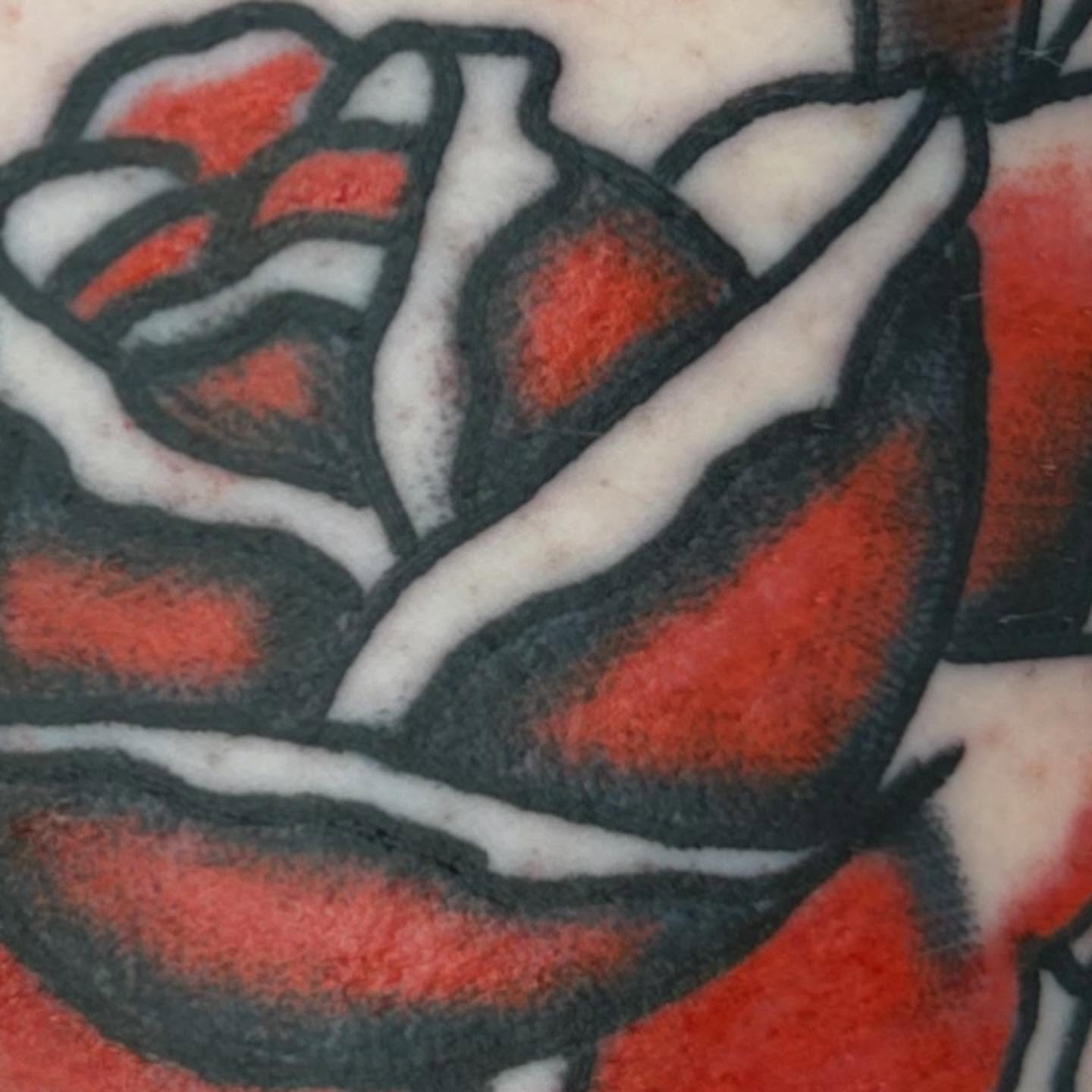 Rose American traditional tattoo on the forearm by Stephen Galena