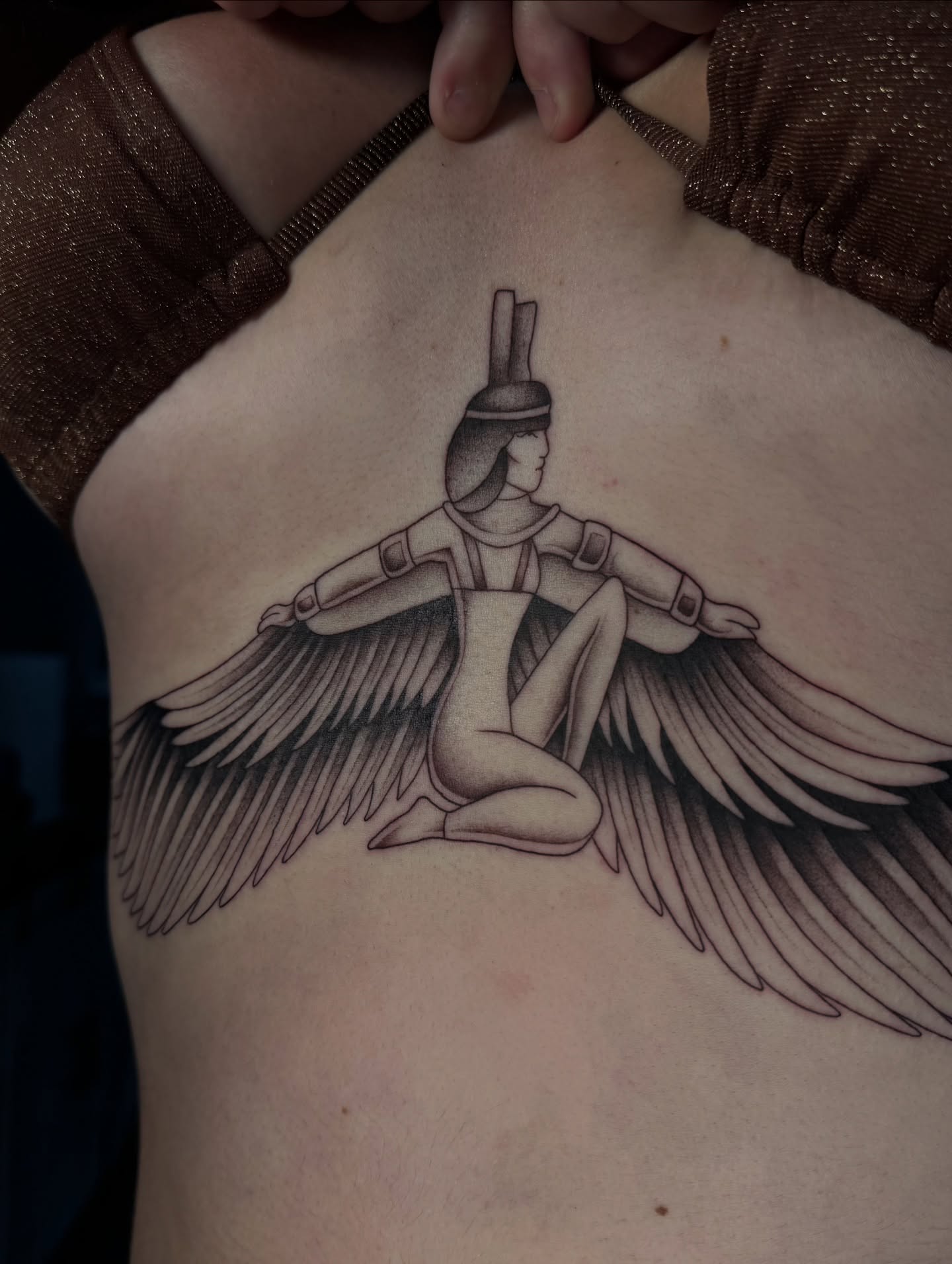 Winged goddess black and grey tattoo on the ribs by 𝔍𝔲𝔩𝔦𝔞, New York, New York