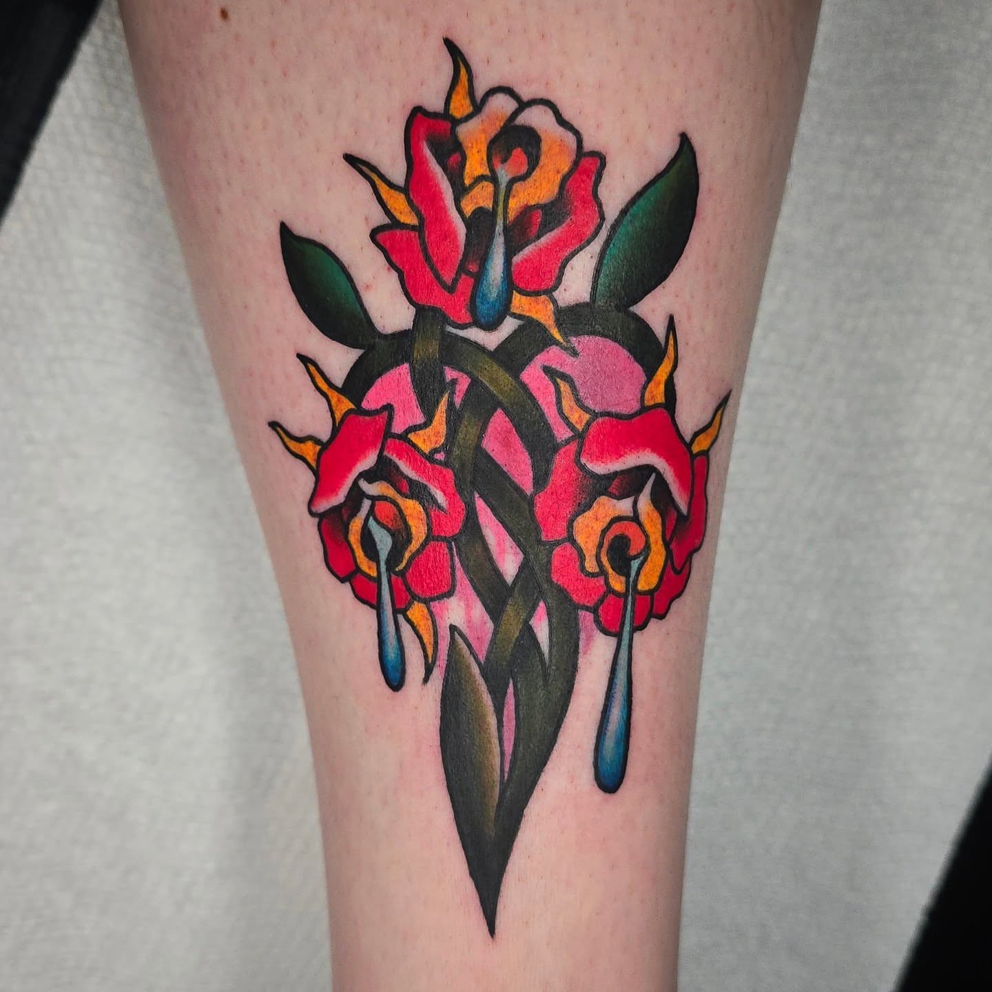 Roses American traditional tattoo on the forearm by Joseph Jeffers