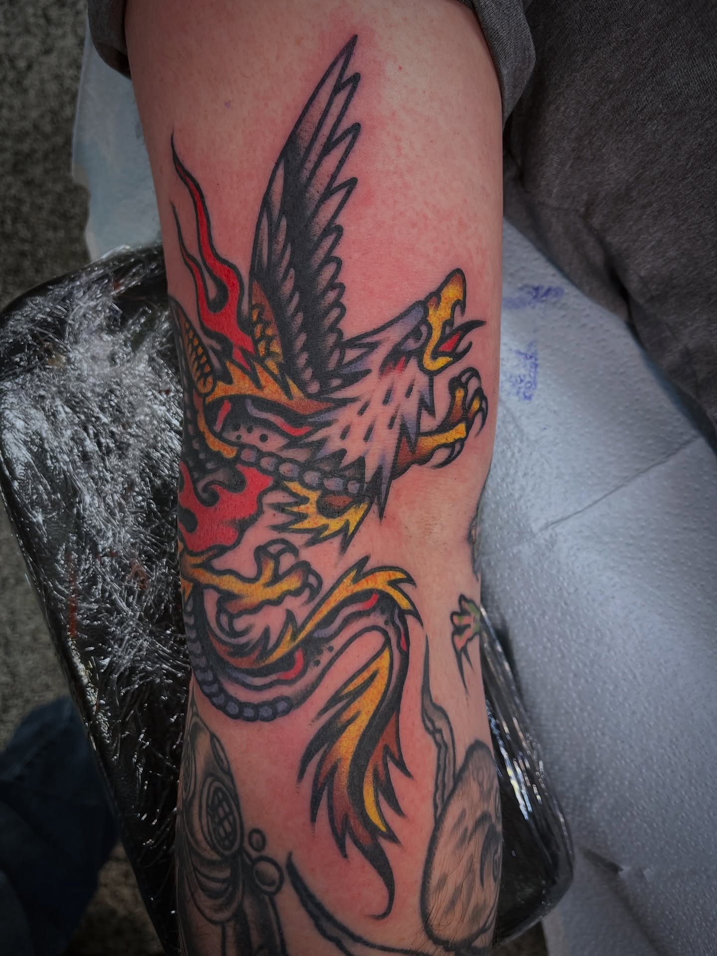 Dragon American traditional tattoo on the forearm by Deya Aven, Nashville, Tennessee