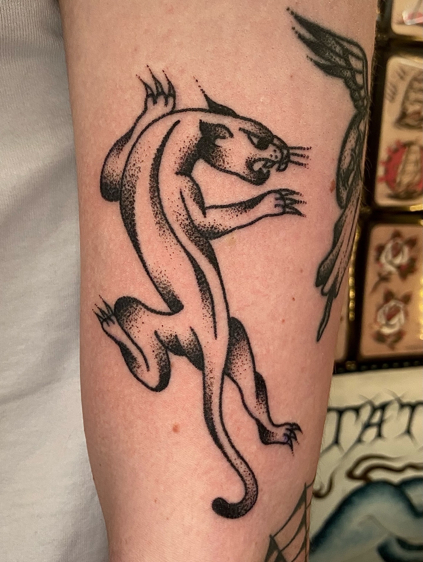 Panther dotwork tattoo on the forearm by Daniel Diego