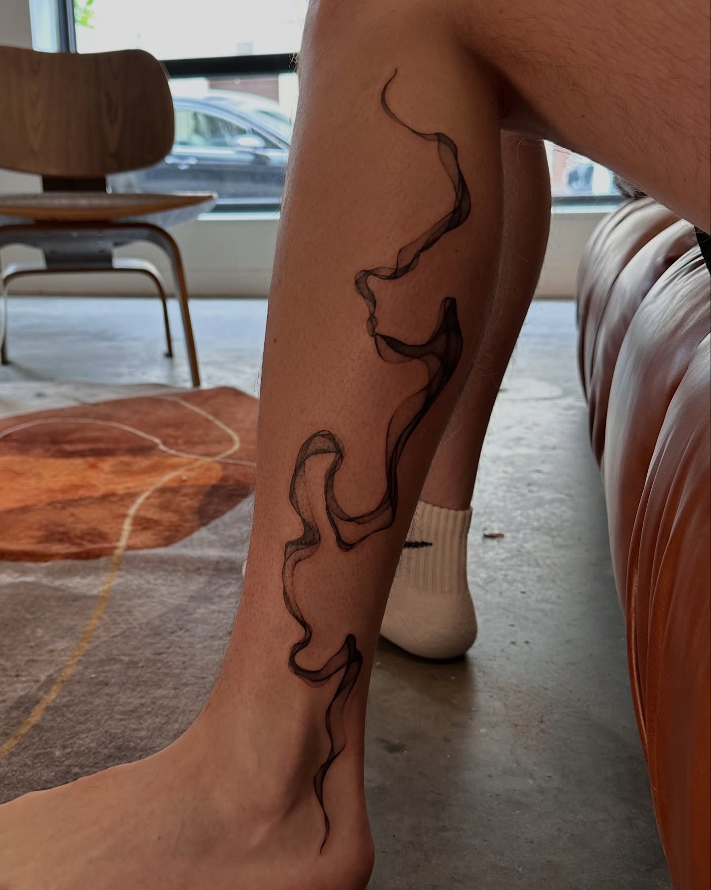 Abstract swirls black and grey tattoo on the calf by Soohee Jin✨ NYC tattoo artist