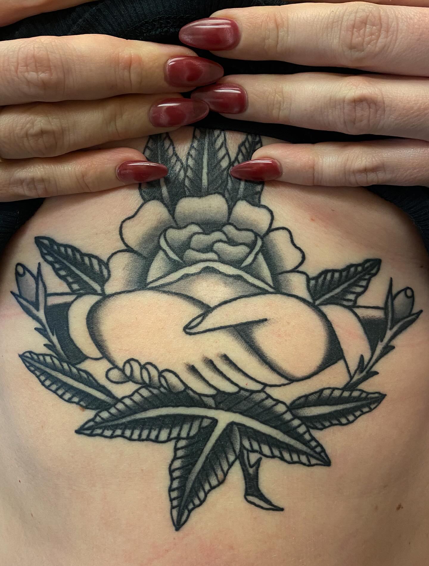 Rose black and grey tattoo on the chest by Abby Rose Estes