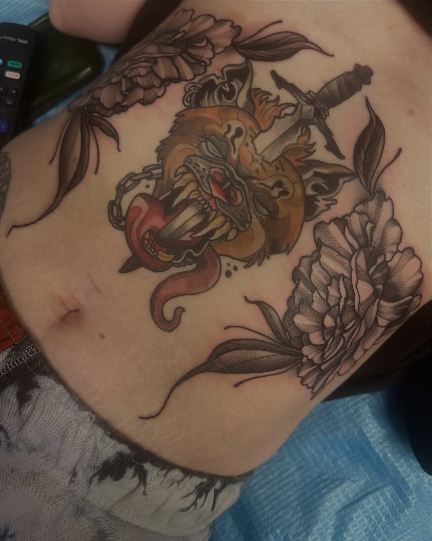 Tiger and flowers American traditional tattoo on the thigh by Carly🪲 greensboro tattoo artist, Greensboro, North Carolina