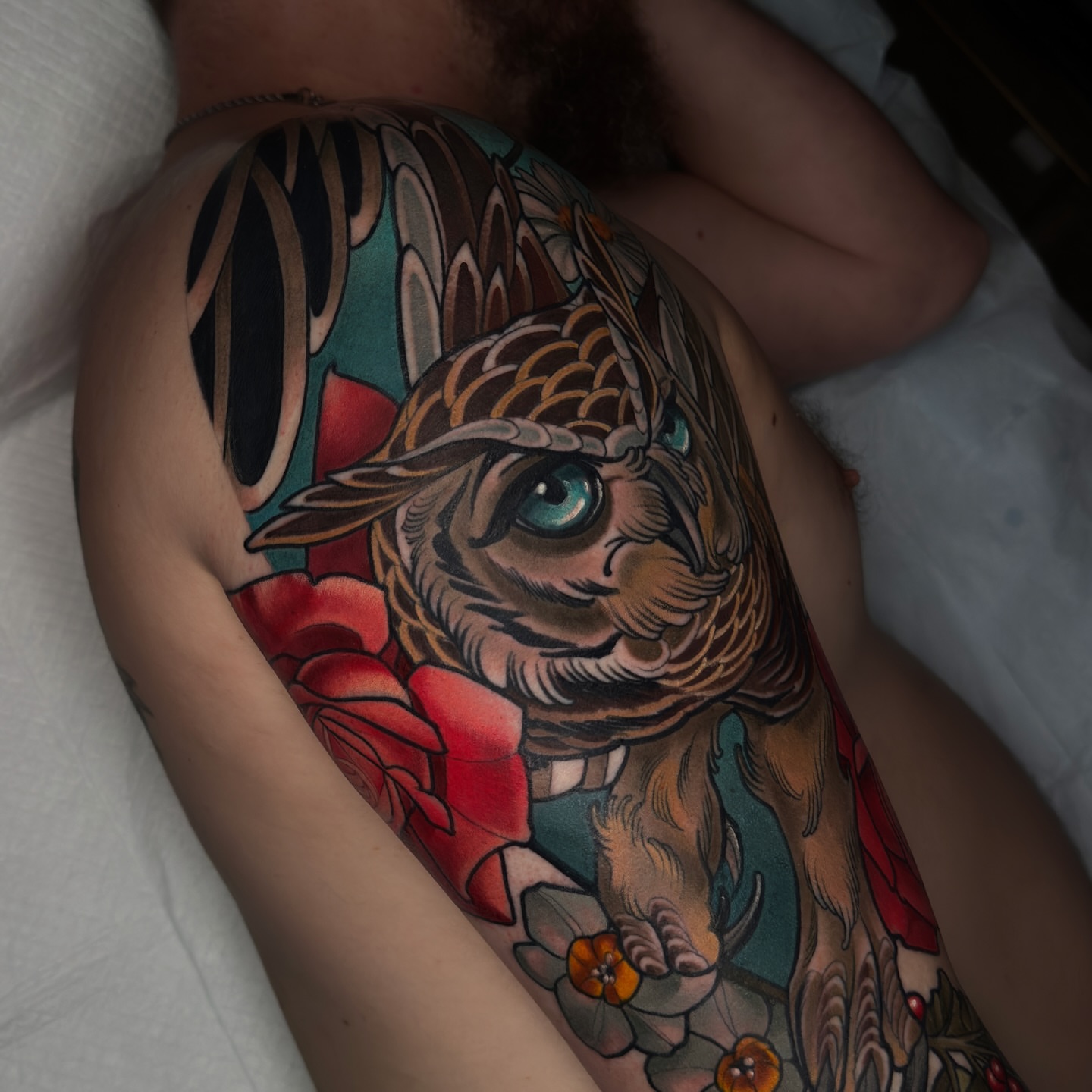 Tiger and roses American traditional tattoo on the thigh by Golden Heart Tattoo Co