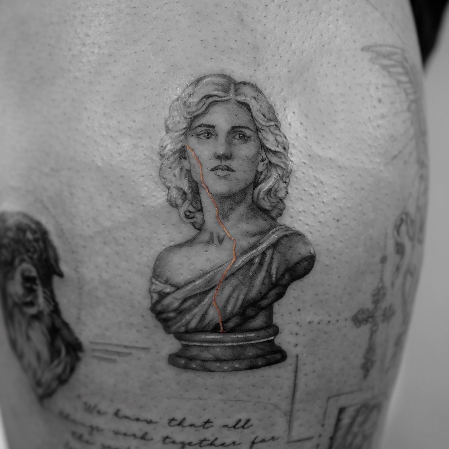 Statue bust realism tattoo on the thigh by Ross Clark Tattoos