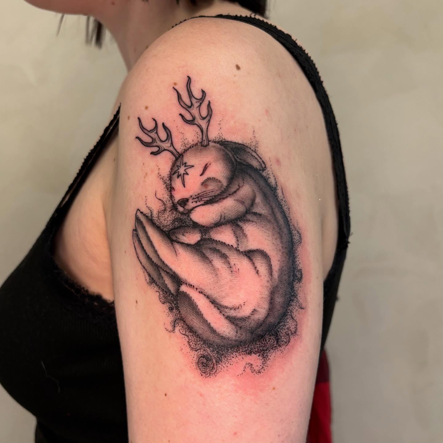 Deer head with antlers dotwork tattoo on the shoulder by Dallas Davis