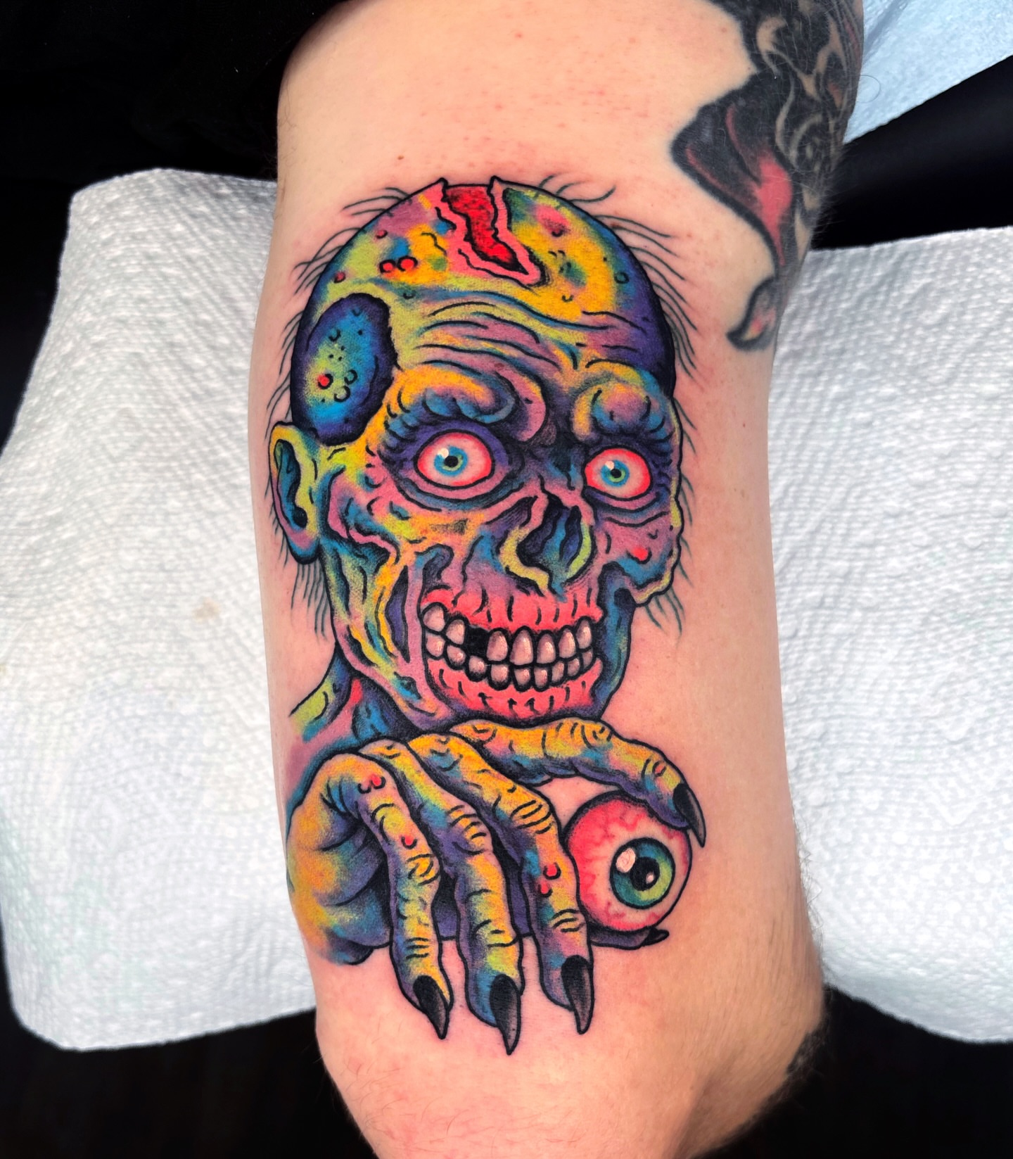 Zombie head new school tattoo on the forearm by Randy Conner, Portland, Oregon