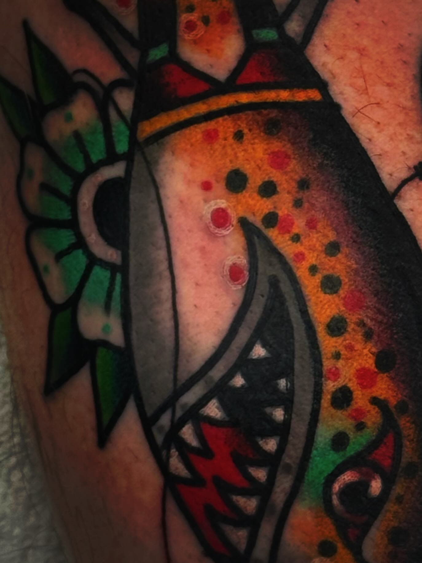 Fish American traditional tattoo on the forearm by Mikey Sarratt