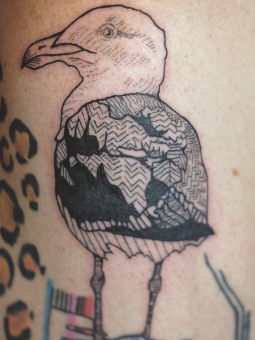 Seagull black and grey tattoo on the forearm by Emily Rose Lumsdaine