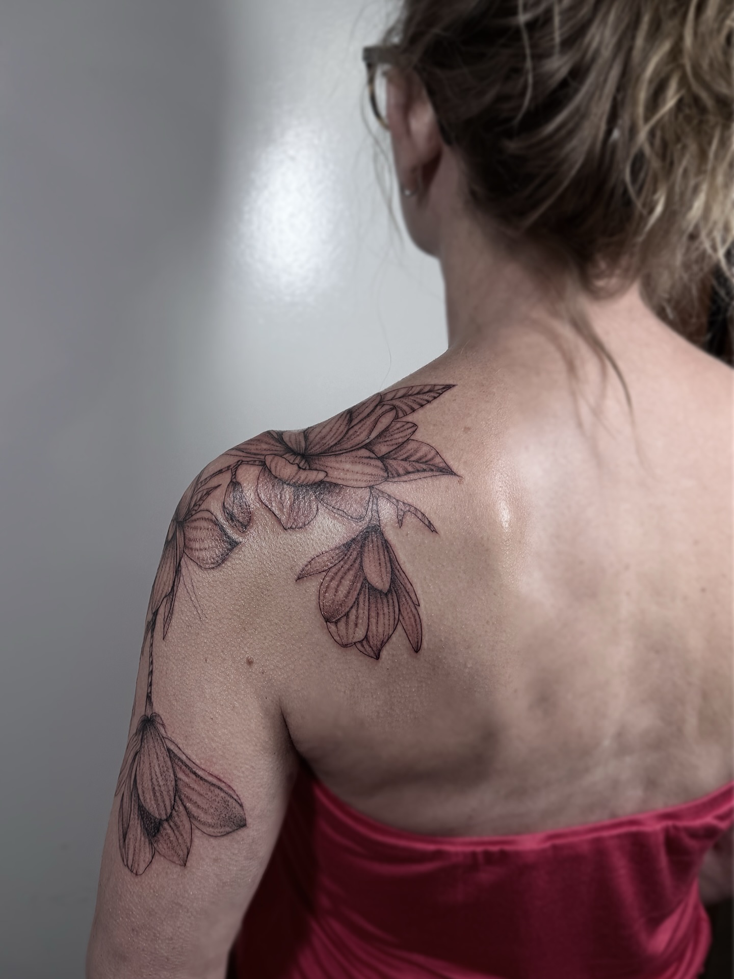 Flowers black and grey tattoo on the shoulder by Rafael Alfredo Armas Hoyos, Salt Lake City, Utah