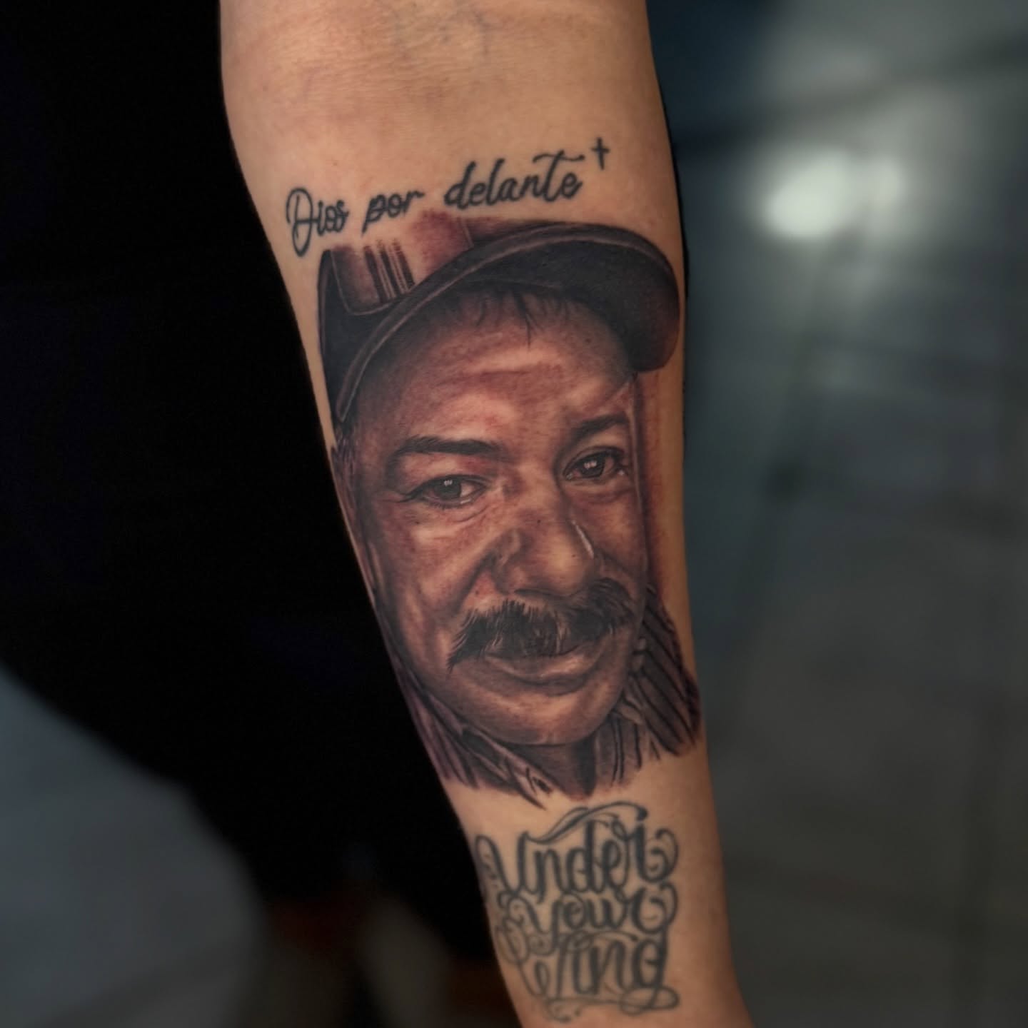 Portrait of a man realism tattoo on the forearm by Eduardo Gomez