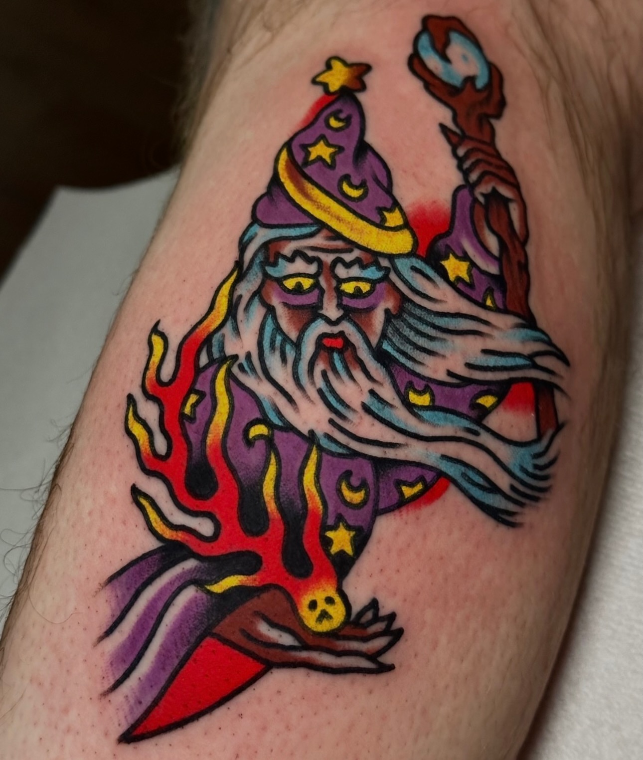 Wizard American traditional tattoo on the forearm by Christian Rieben