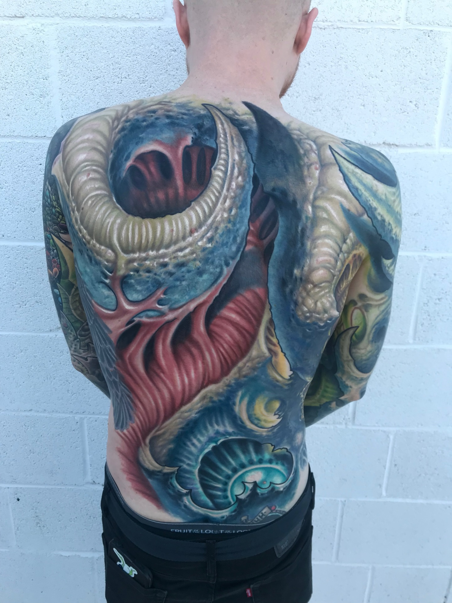 Monster realism tattoo on the back by Ty McEwen Tattoo Artist │ Bioorganic │