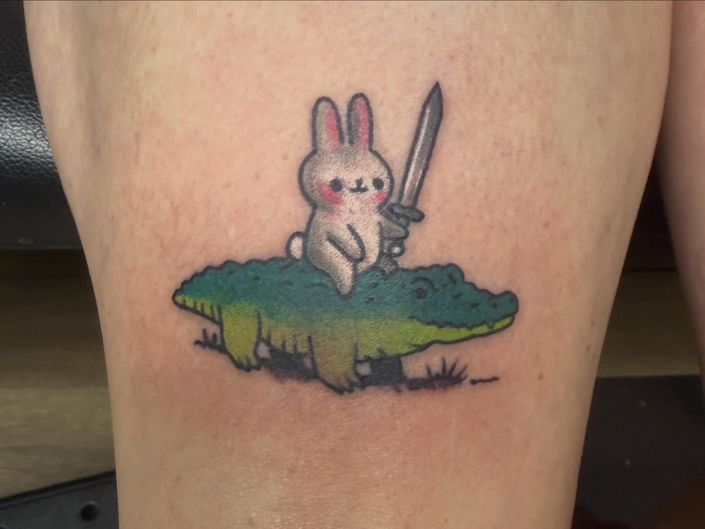 Rabbit on crocodile dotwork tattoo on the thigh by Tina Gregg, North Ridgeville, Ohio