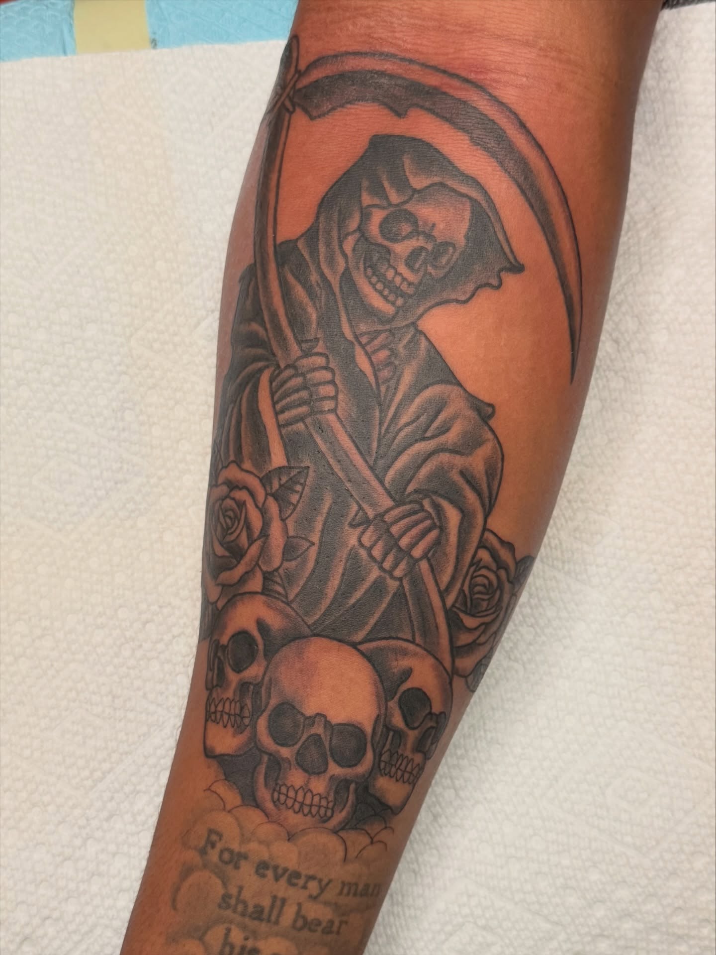 Grim reaper black and grey tattoo on the forearm by Andre Guerra