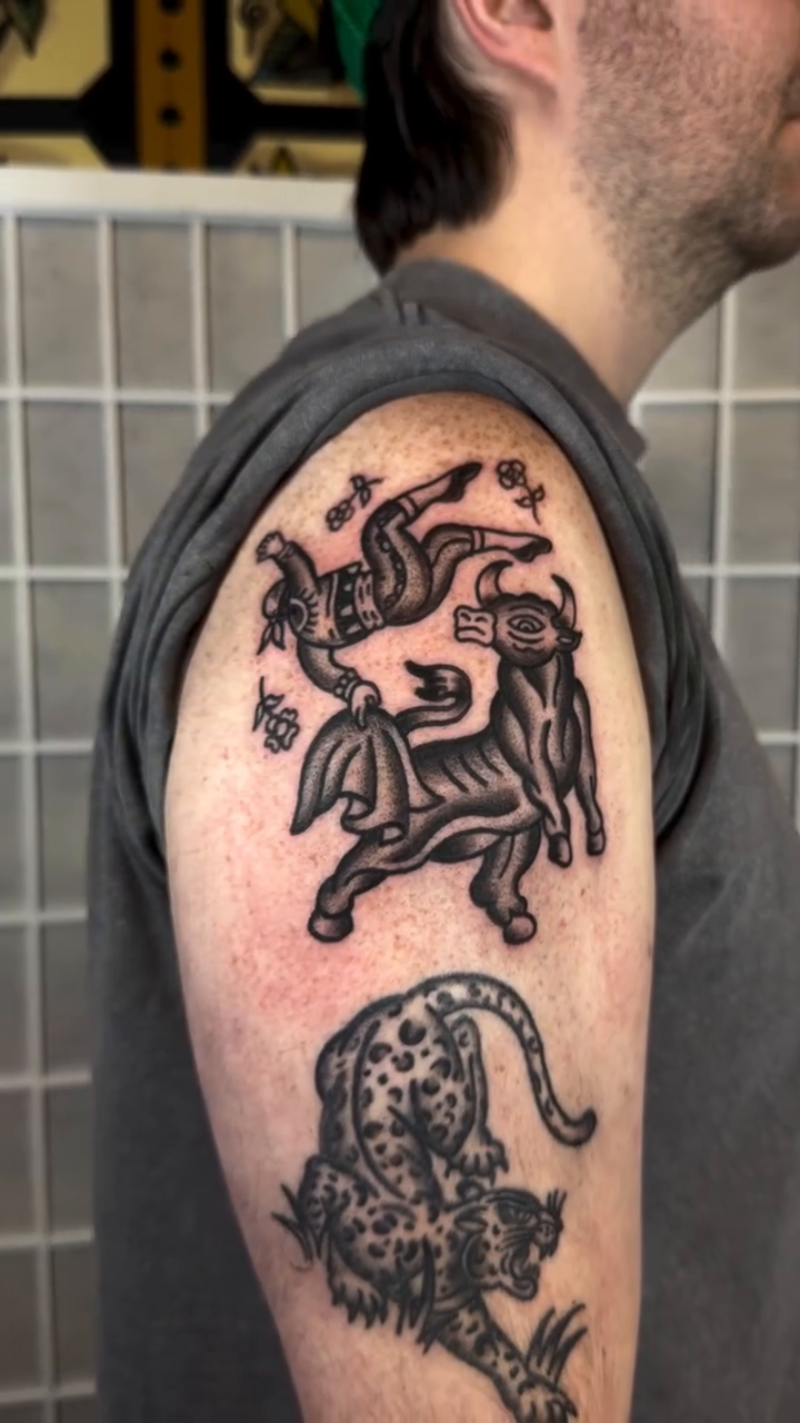 Bull and panther American traditional tattoo by Vlad Nemirovsky Tattoo