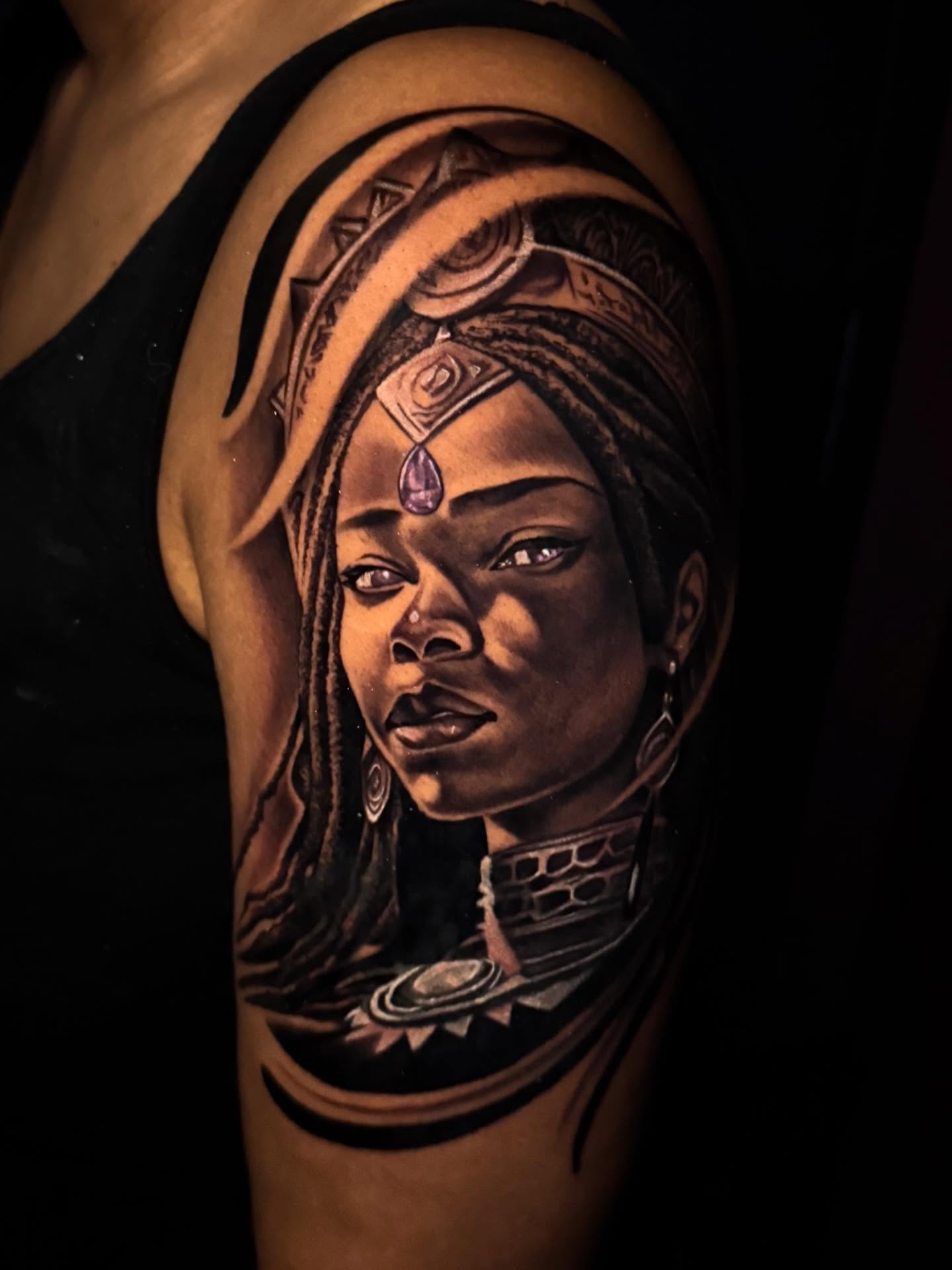 Tattoo by @thetattoosaint — realism, black_and_grey