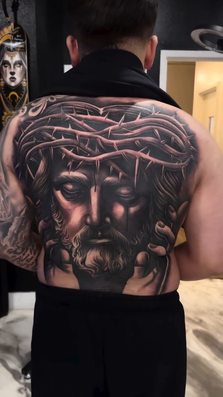 Jesus Christ portrait realism tattoo by Tattoo