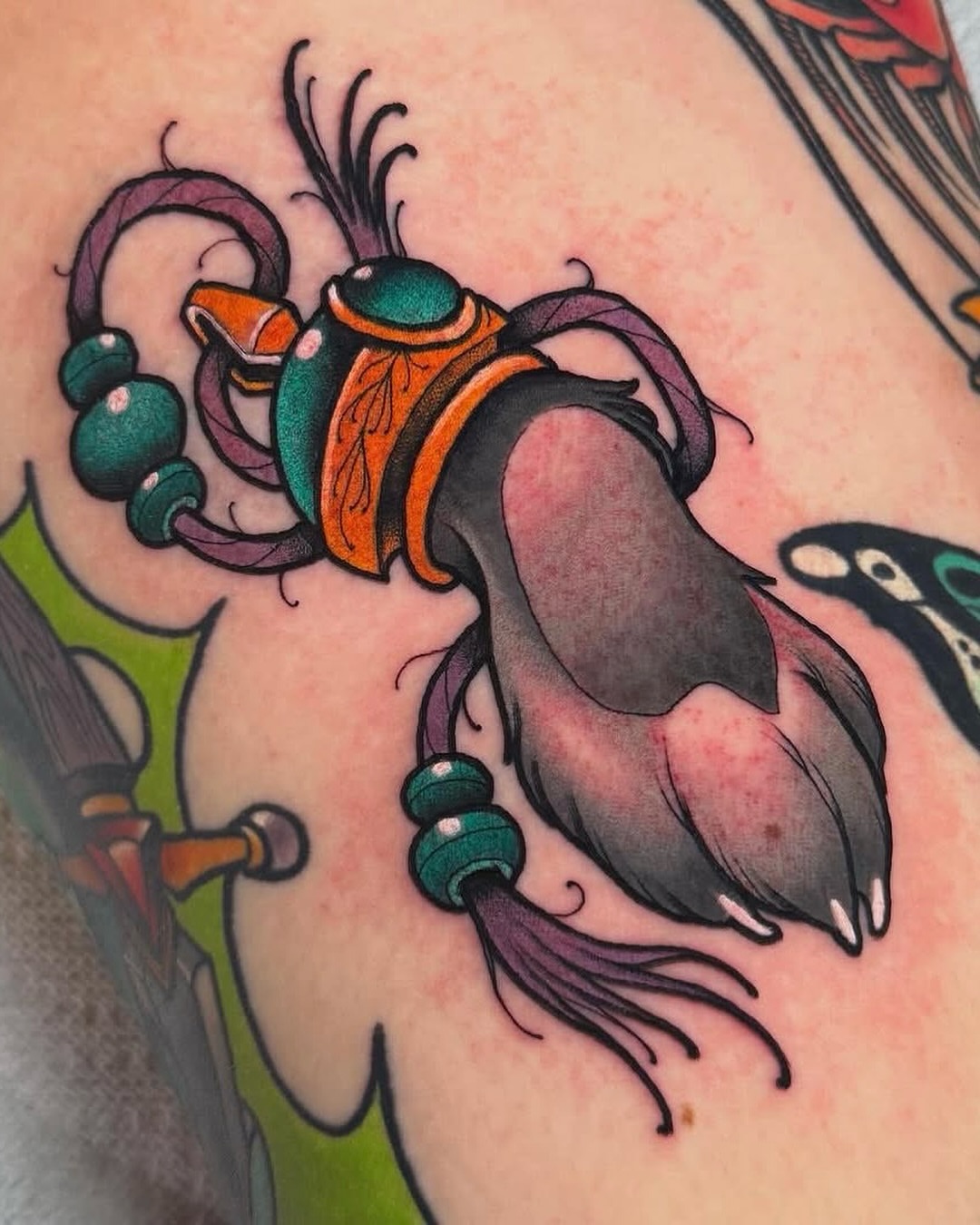 Scarab beetle American traditional tattoo on the shoulder by Jess Longfield, Des Moines, Iowa