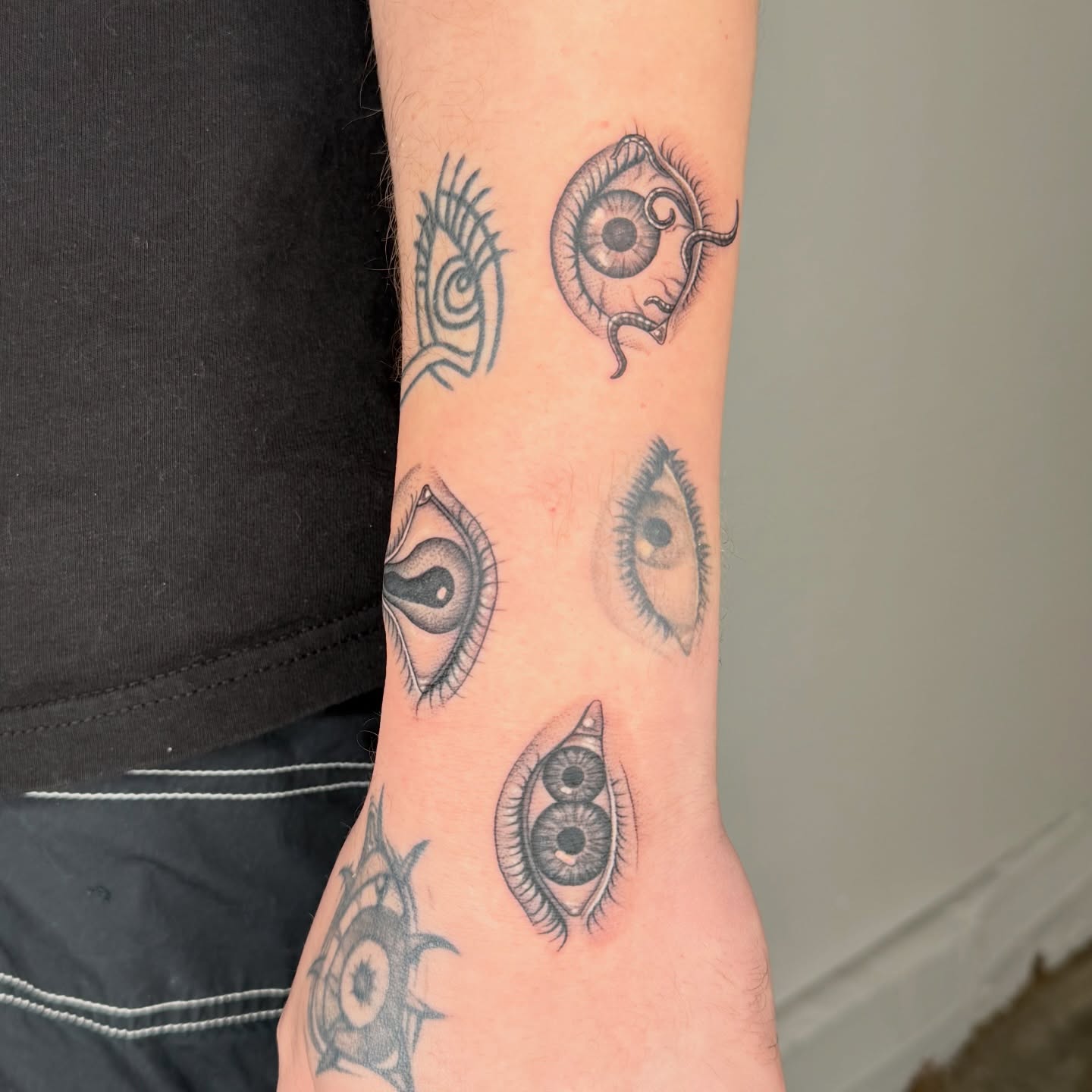 Eyes realism tattoo on the forearm by Rose