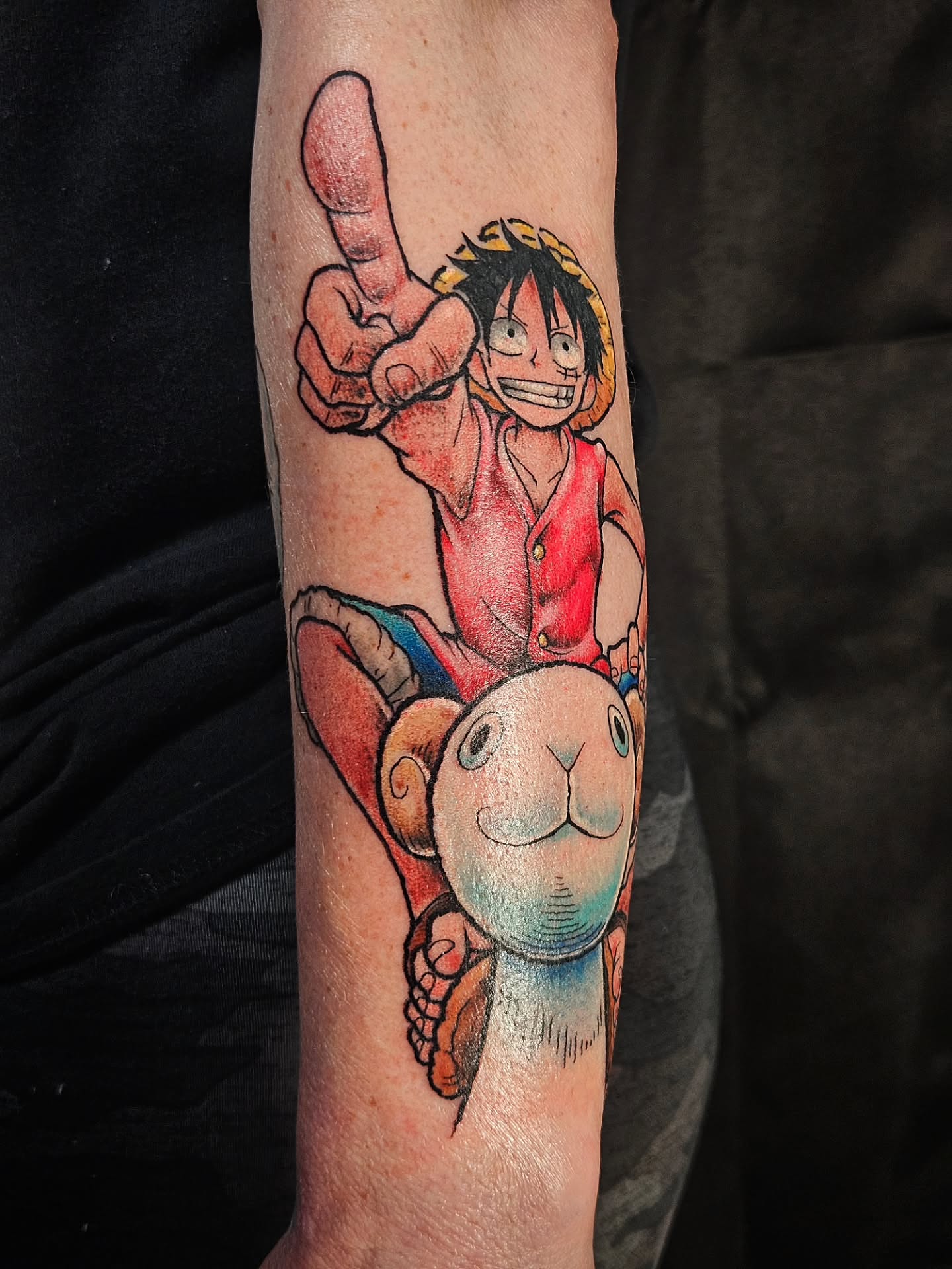 Monkey D. Luffy anime tattoo on the forearm by Damian Eames