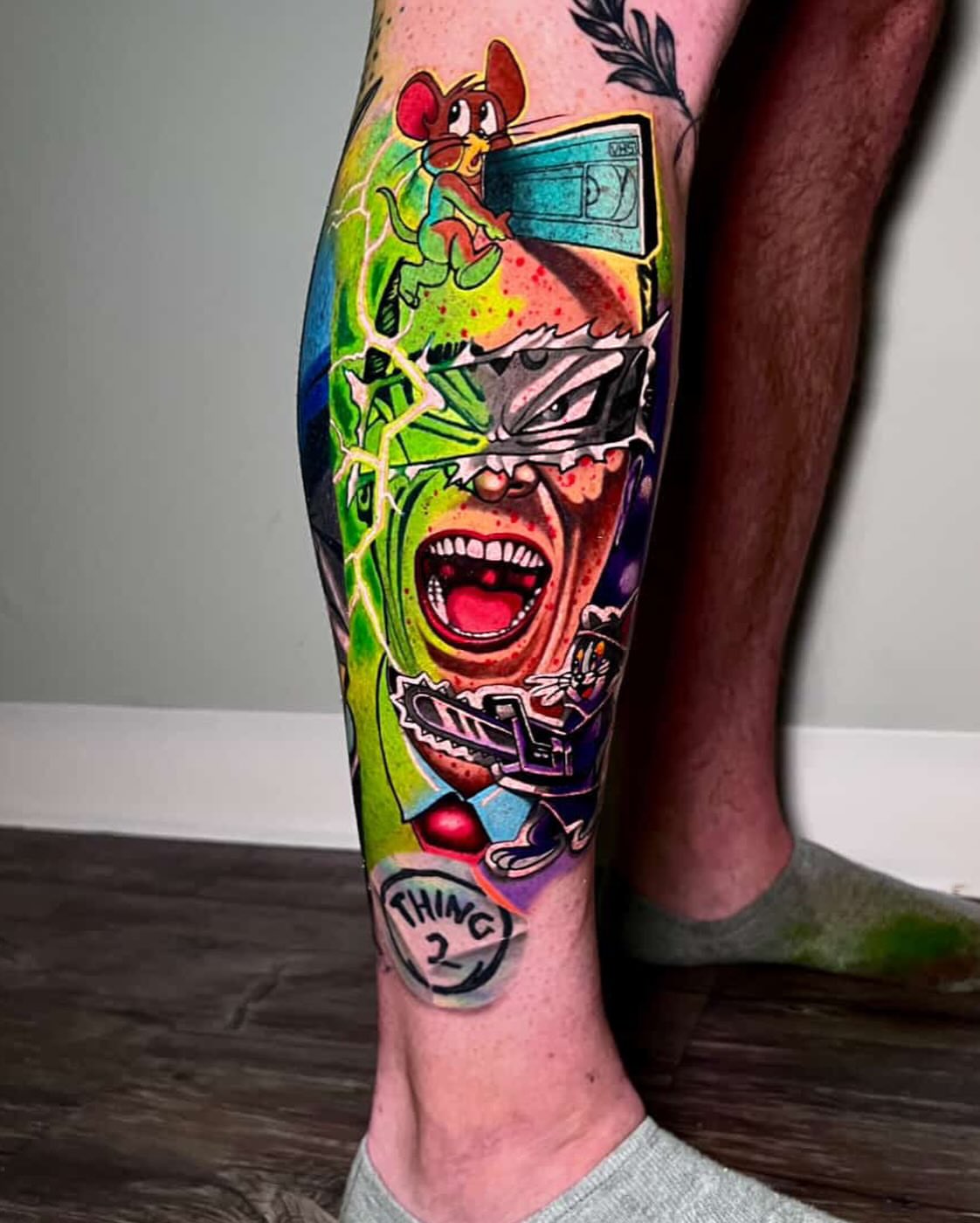 Cartoon character illustrative tattoo on the calf by Randy Templin Tattoo Artist, Virginia Beach, Virginia