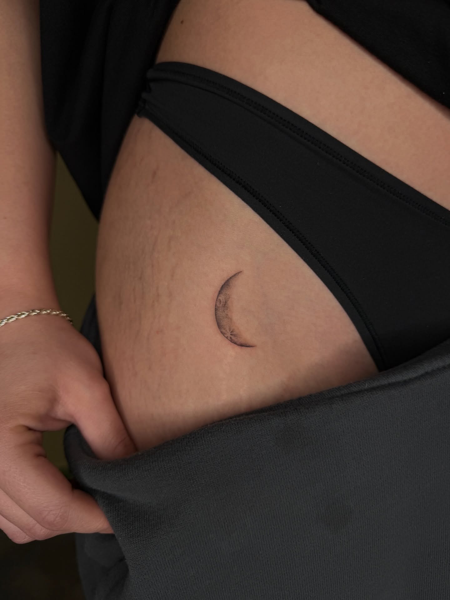 Moon black and grey tattoo on the torso by Fabian💉 Tattoo artist