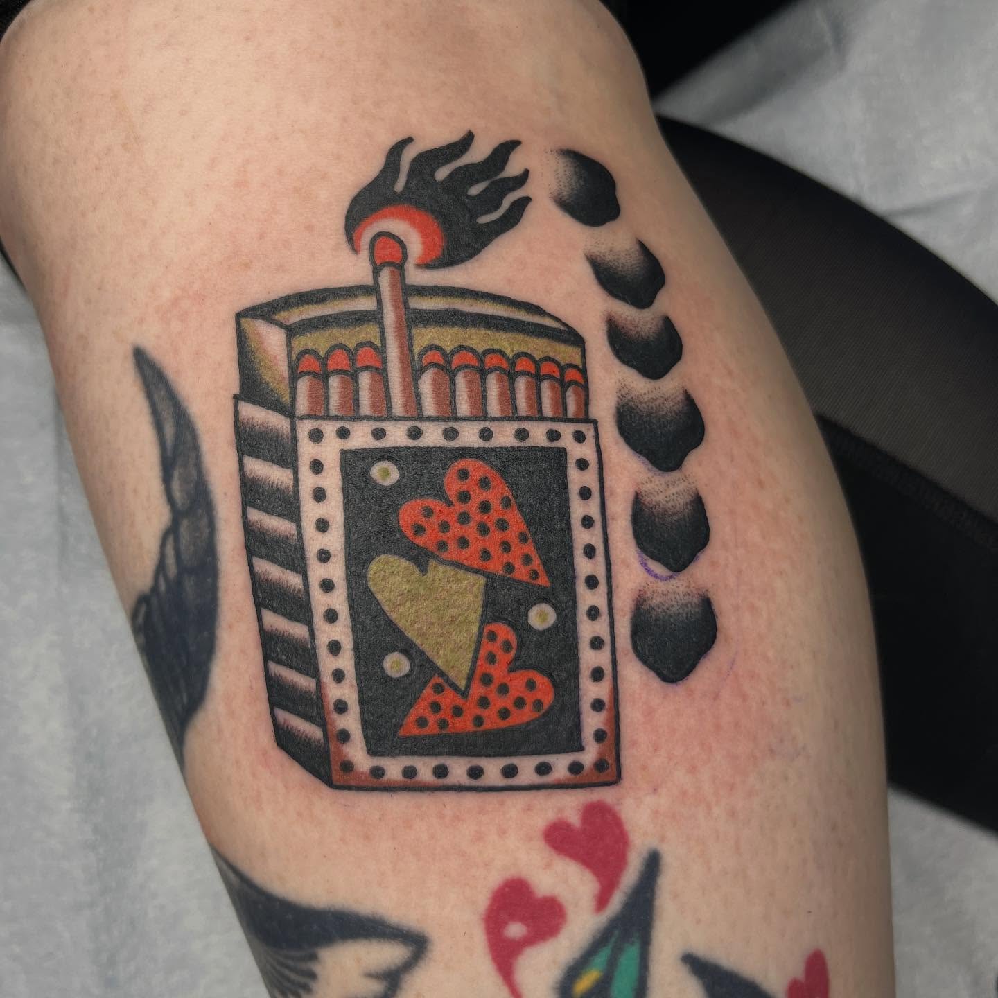Matchbox with hearts American traditional tattoo on the thigh by Nicole💀, Salt Lake City, Utah