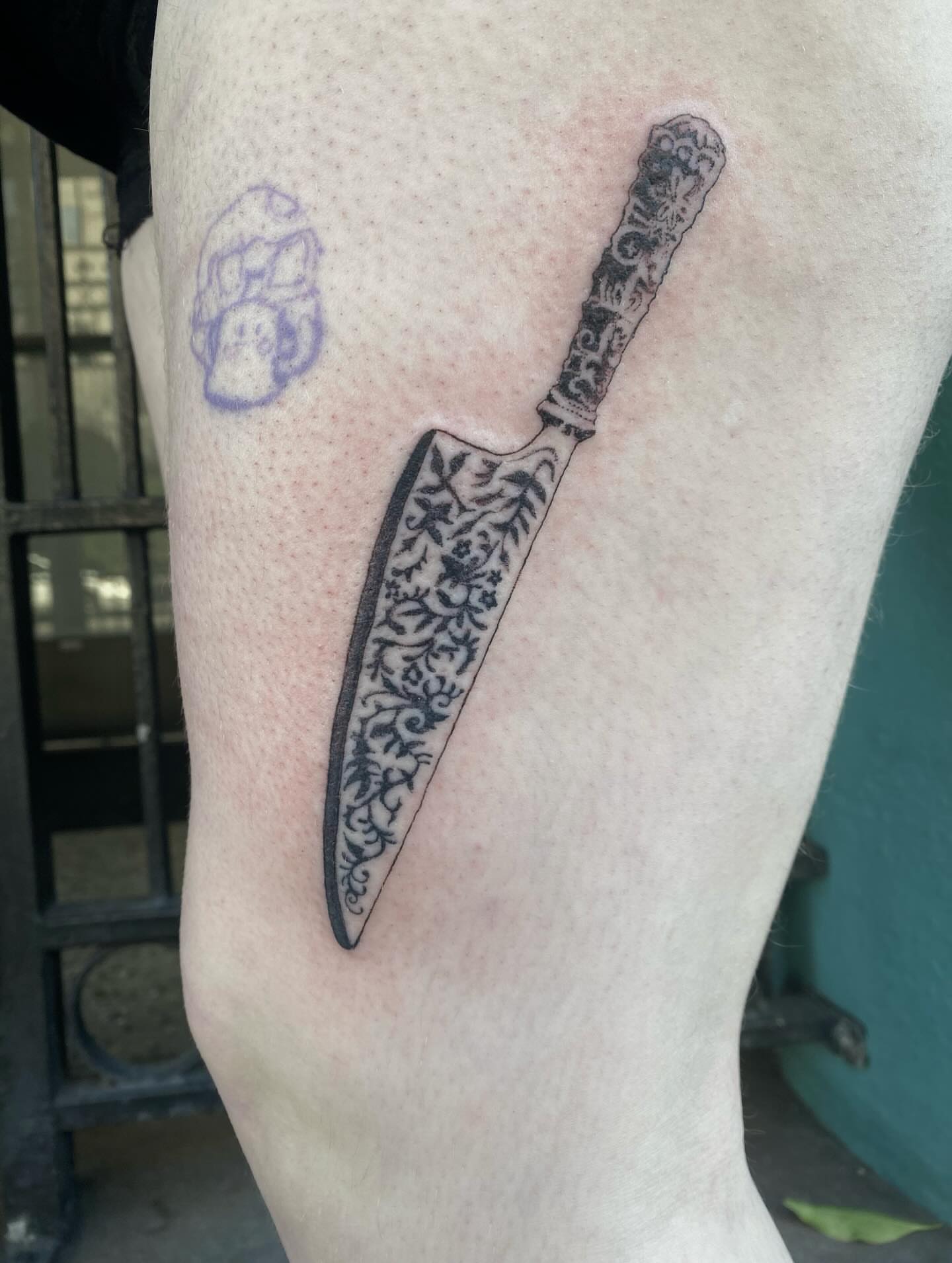 Knife black and grey tattoo on the leg by sarah 🗝️