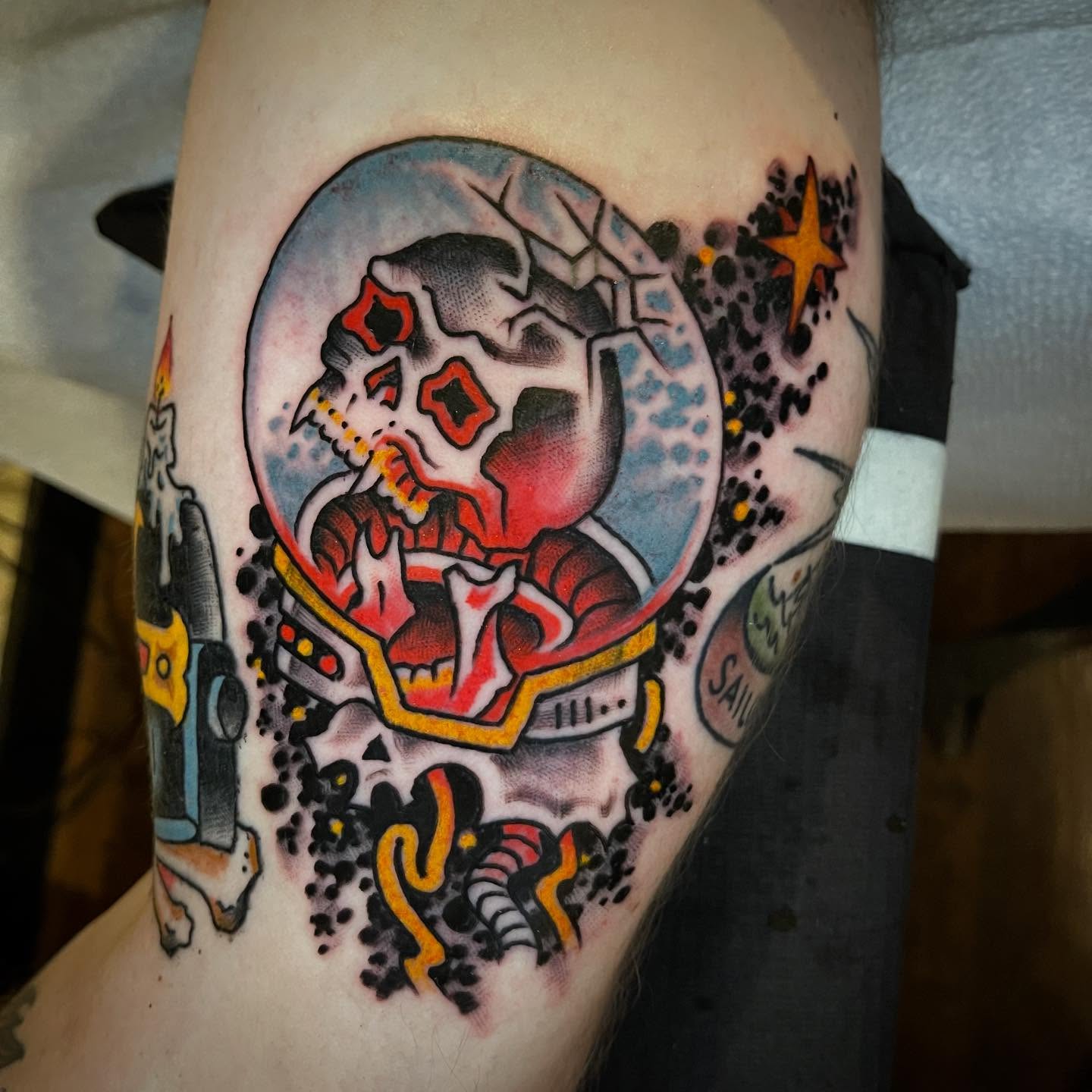 Astronaut skull American traditional tattoo on the forearm by Ian Bederman, Austin, Texas