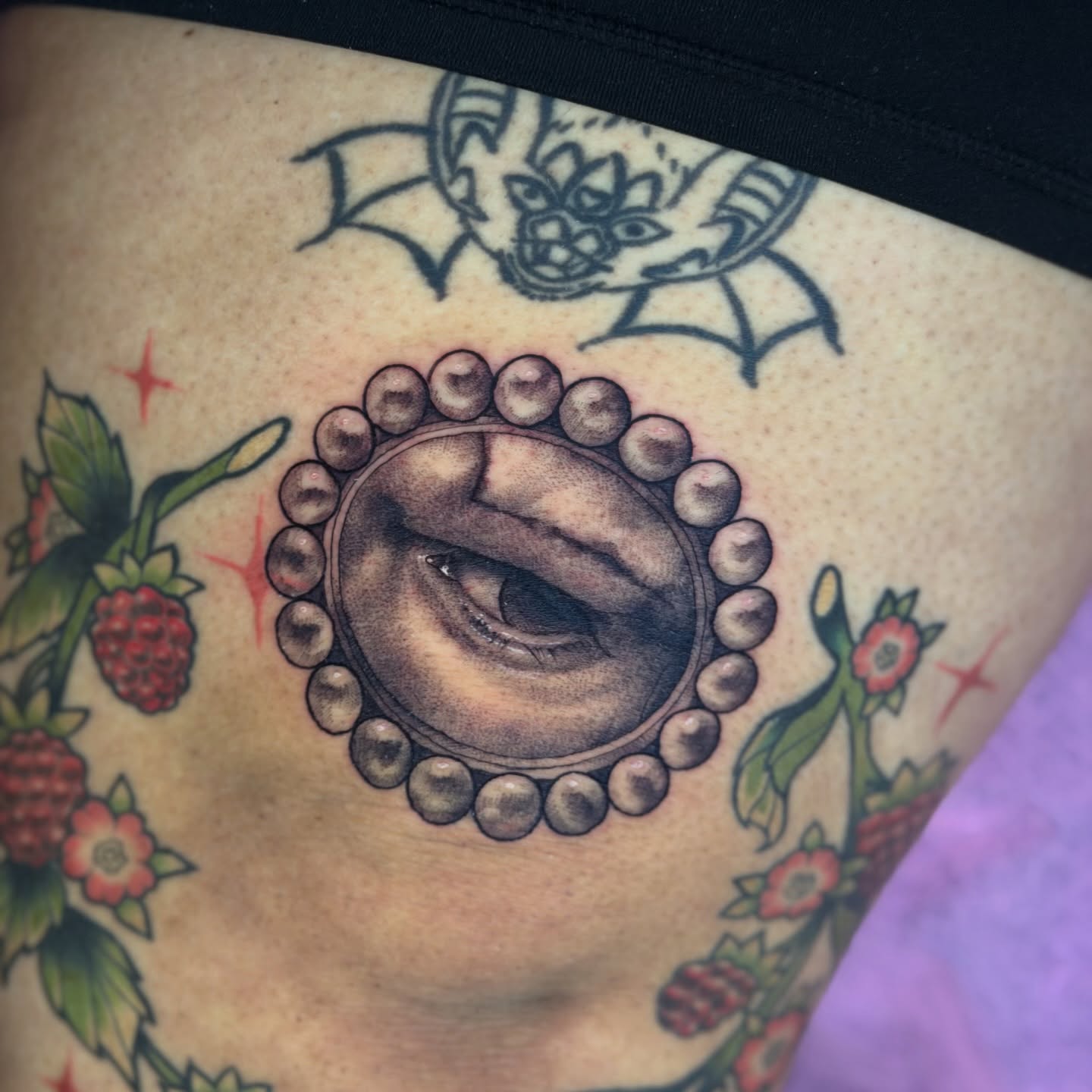 Eye within beads American traditional tattoo on the thigh by natalia sanchez