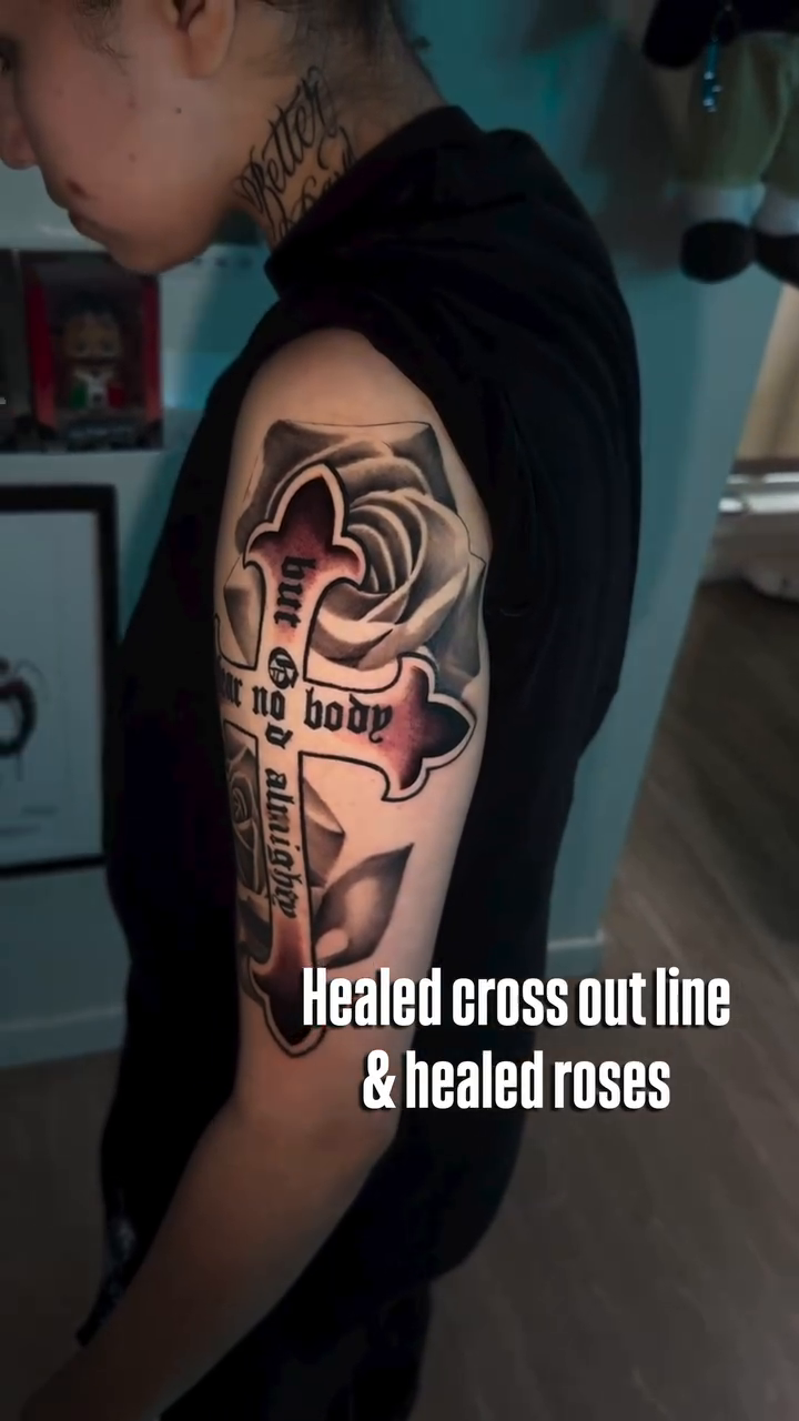 Cross with roses and lettering lettering script tattoo by Danny Vazquez