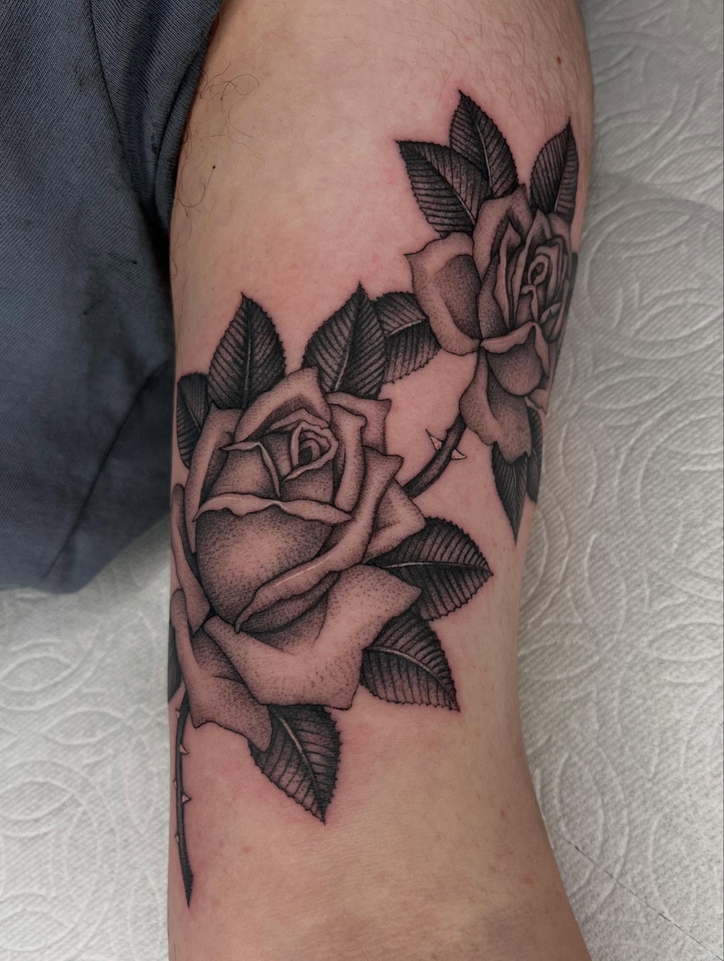 Roses black and grey tattoo on the forearm by The One Who’s Always Drawing